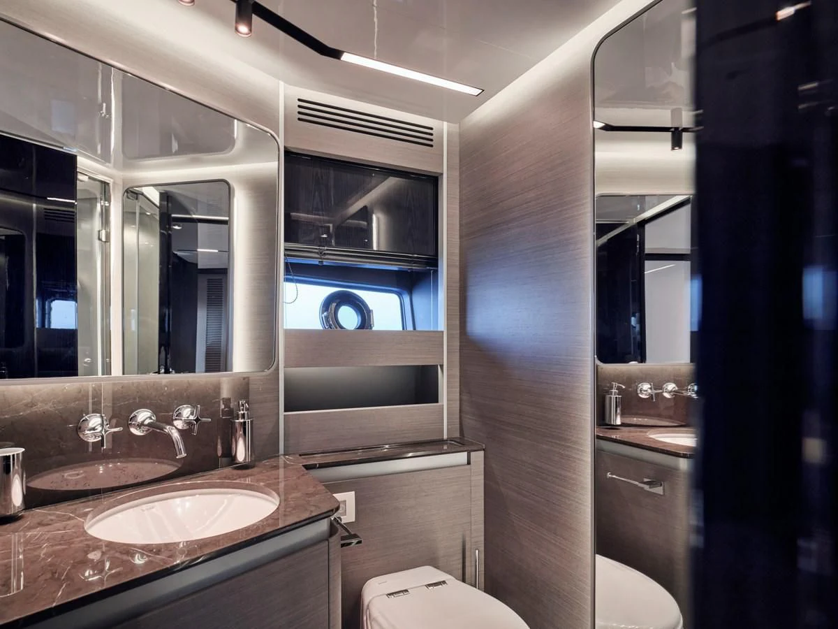 a bathroom with a sink and a mirror aboard D FIVE Yacht for Sale