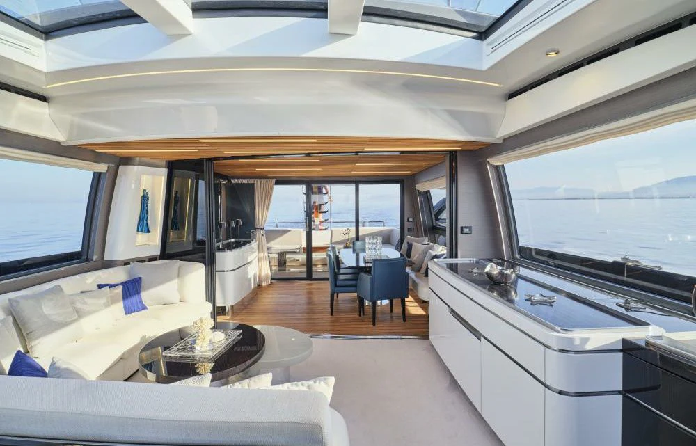 a living room with a large window aboard D FIVE Yacht for Sale