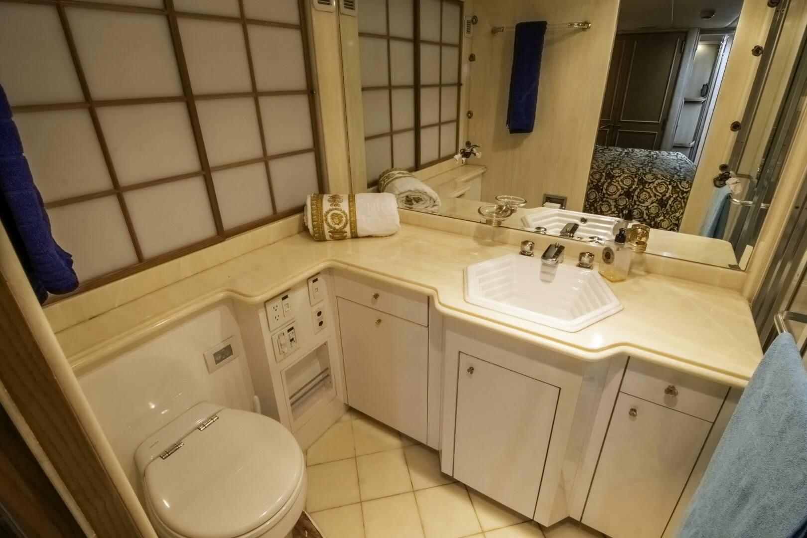 a bathroom with a sink and a toilet aboard LADY AUDREY Yacht for Sale