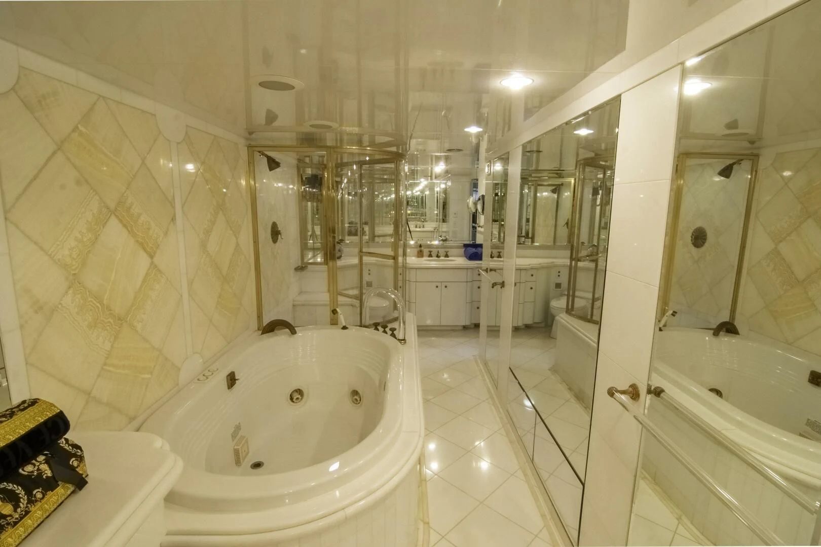 a bathroom with a bathtub and shower aboard LADY AUDREY Yacht for Sale