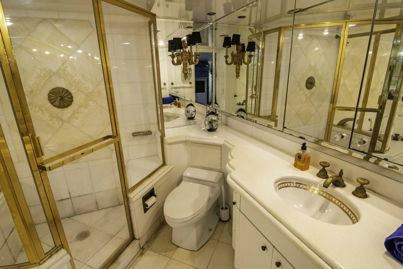 a bathroom with a toilet sink and a shower aboard LADY AUDREY Yacht for Sale
