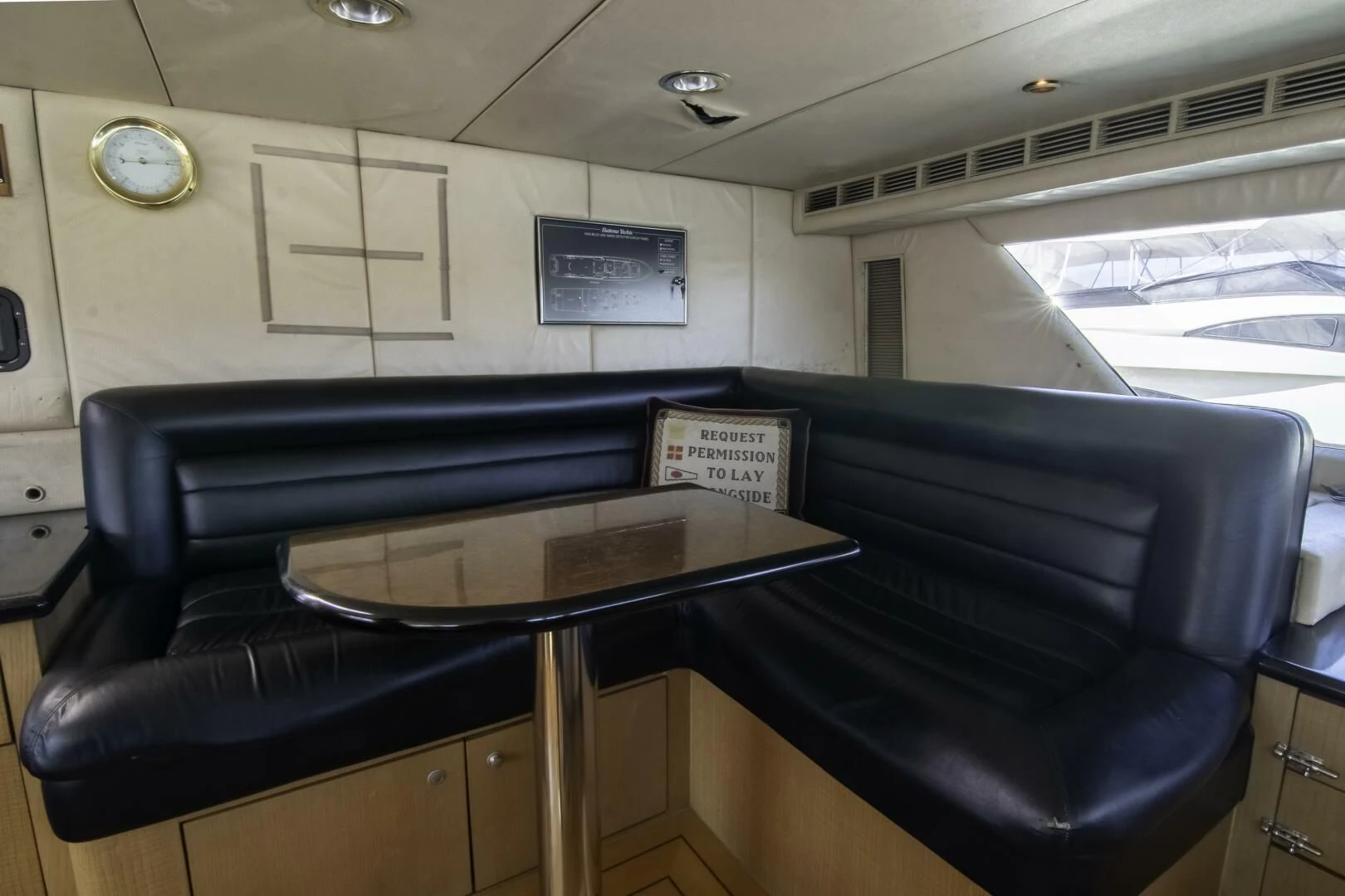 a table with a sign on it aboard LADY AUDREY Yacht for Sale
