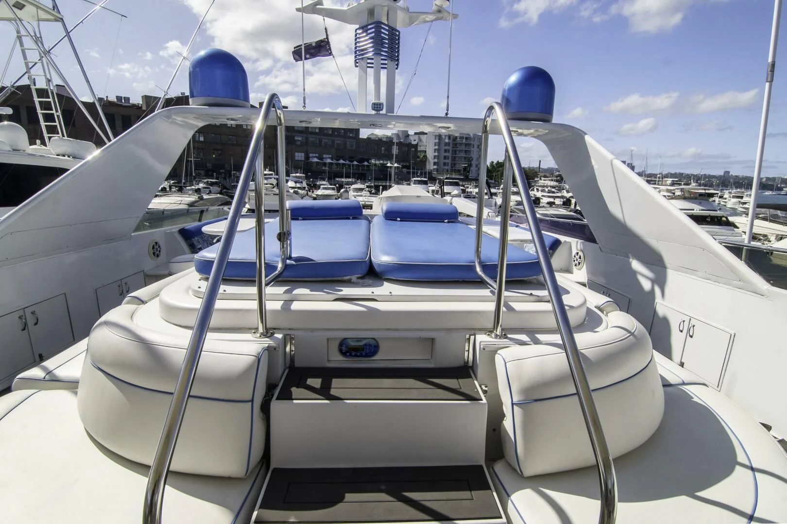 a white boat with blue water and a white sail aboard LADY AUDREY Yacht for Sale
