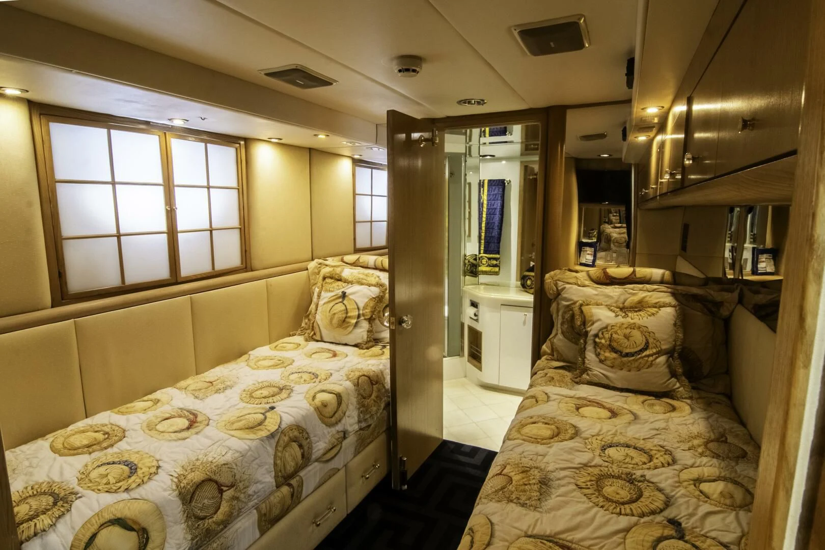 a bedroom with two beds aboard LADY AUDREY Yacht for Sale