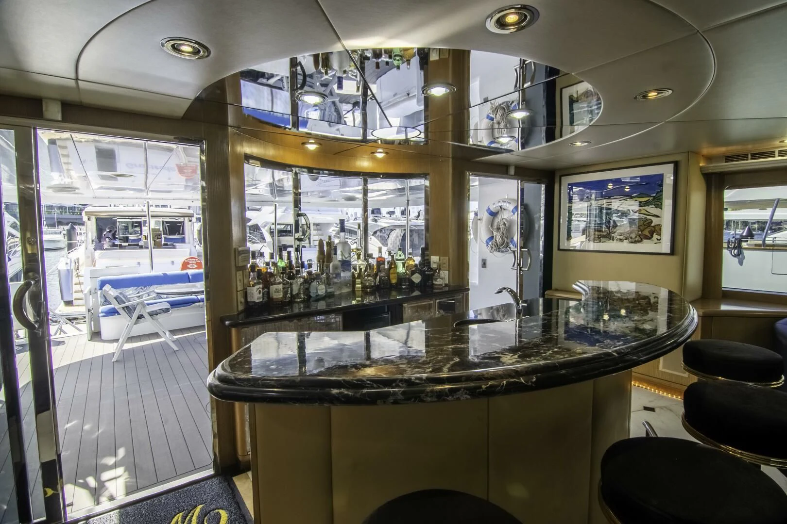 a bar with a bar and a bar aboard LADY AUDREY Yacht for Sale
