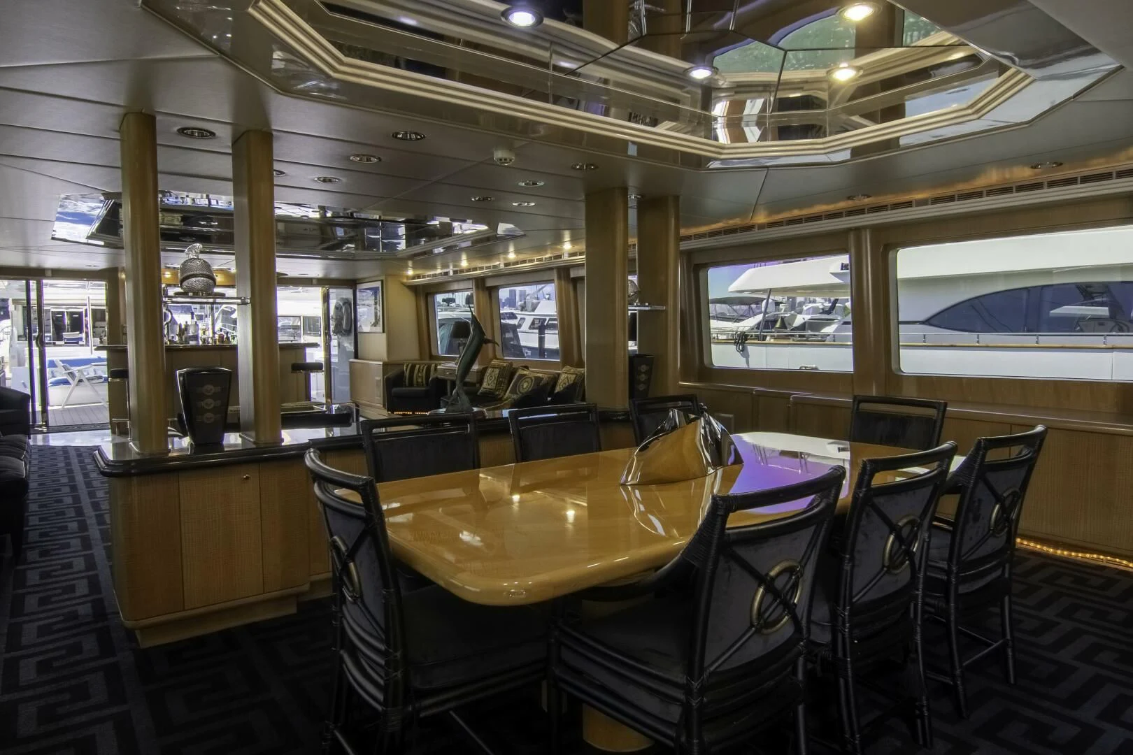 a restaurant with tables and chairs aboard LADY AUDREY Yacht for Sale