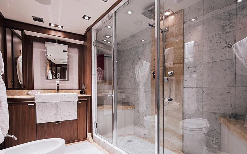 a bathroom with a glass shower aboard BAGHEERA Yacht for Charter