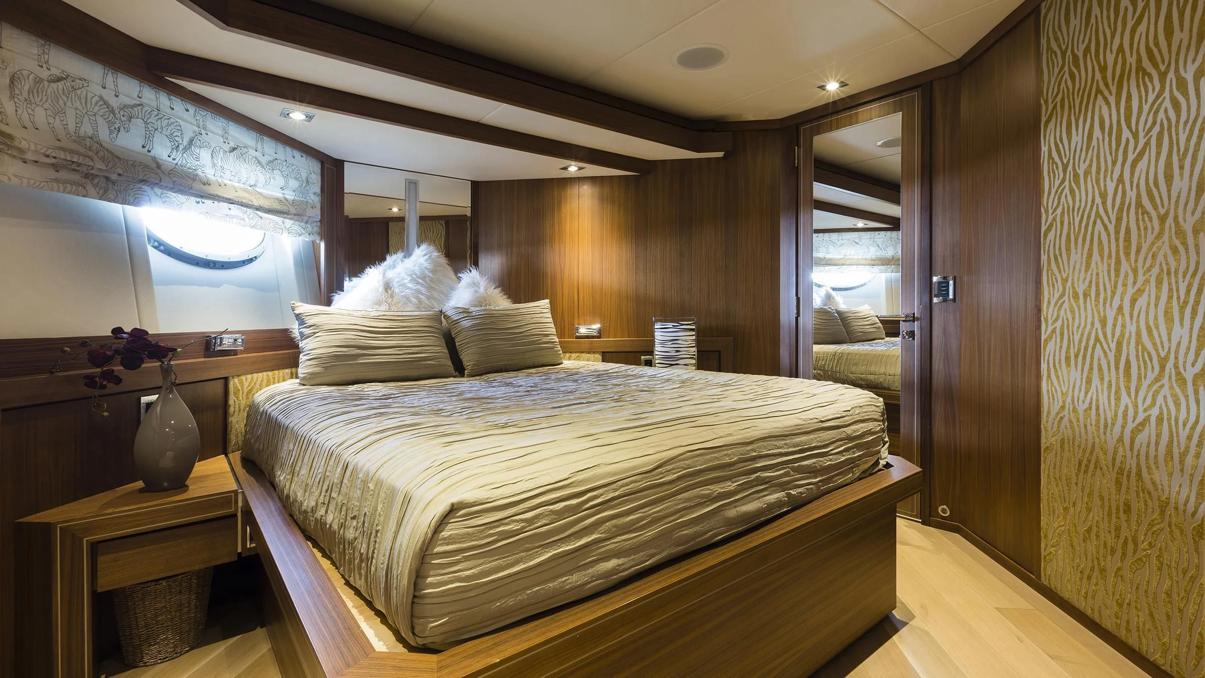 a bed in a room aboard BAGHEERA Yacht for Charter