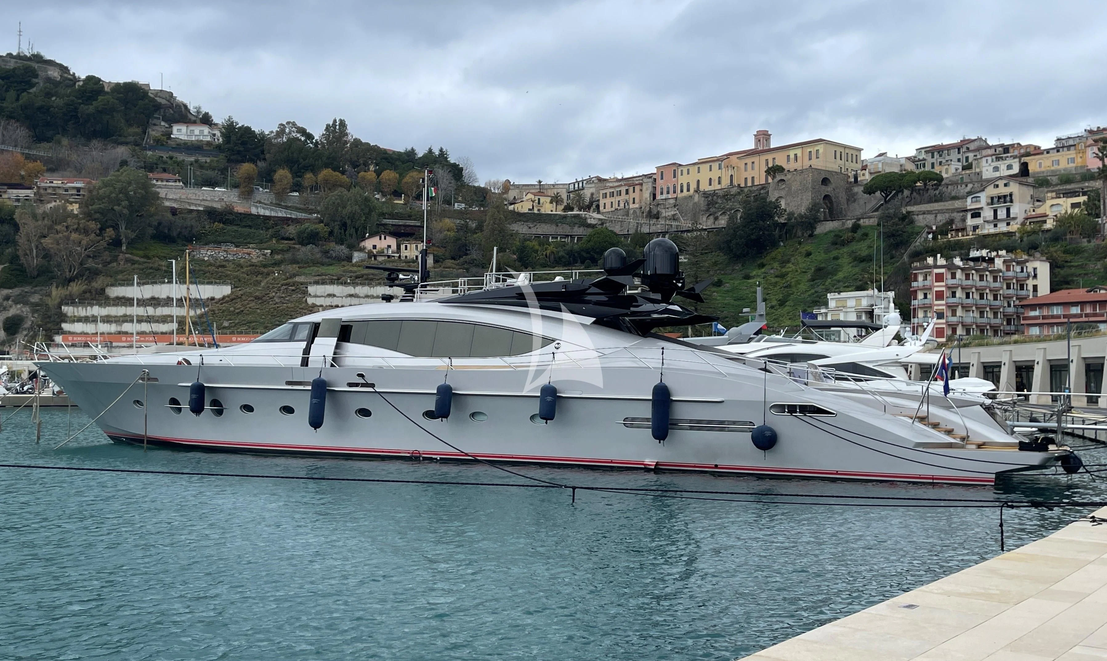 a boat docked at a pier aboard BAGHEERA Yacht for Charter