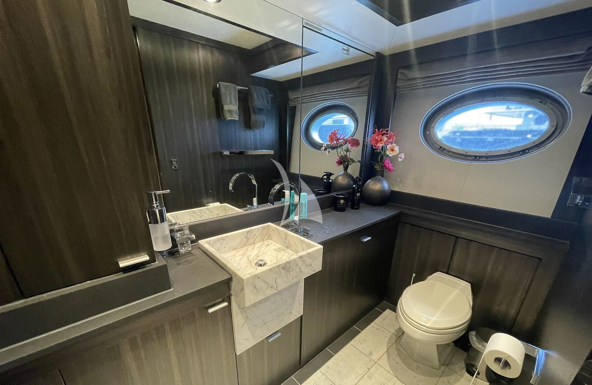 a bathroom with a large mirror aboard BAGHEERA Yacht for Charter