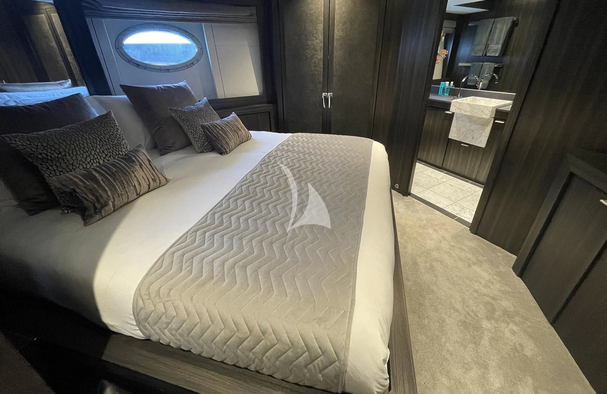 a bed in a room aboard BAGHEERA Yacht for Charter