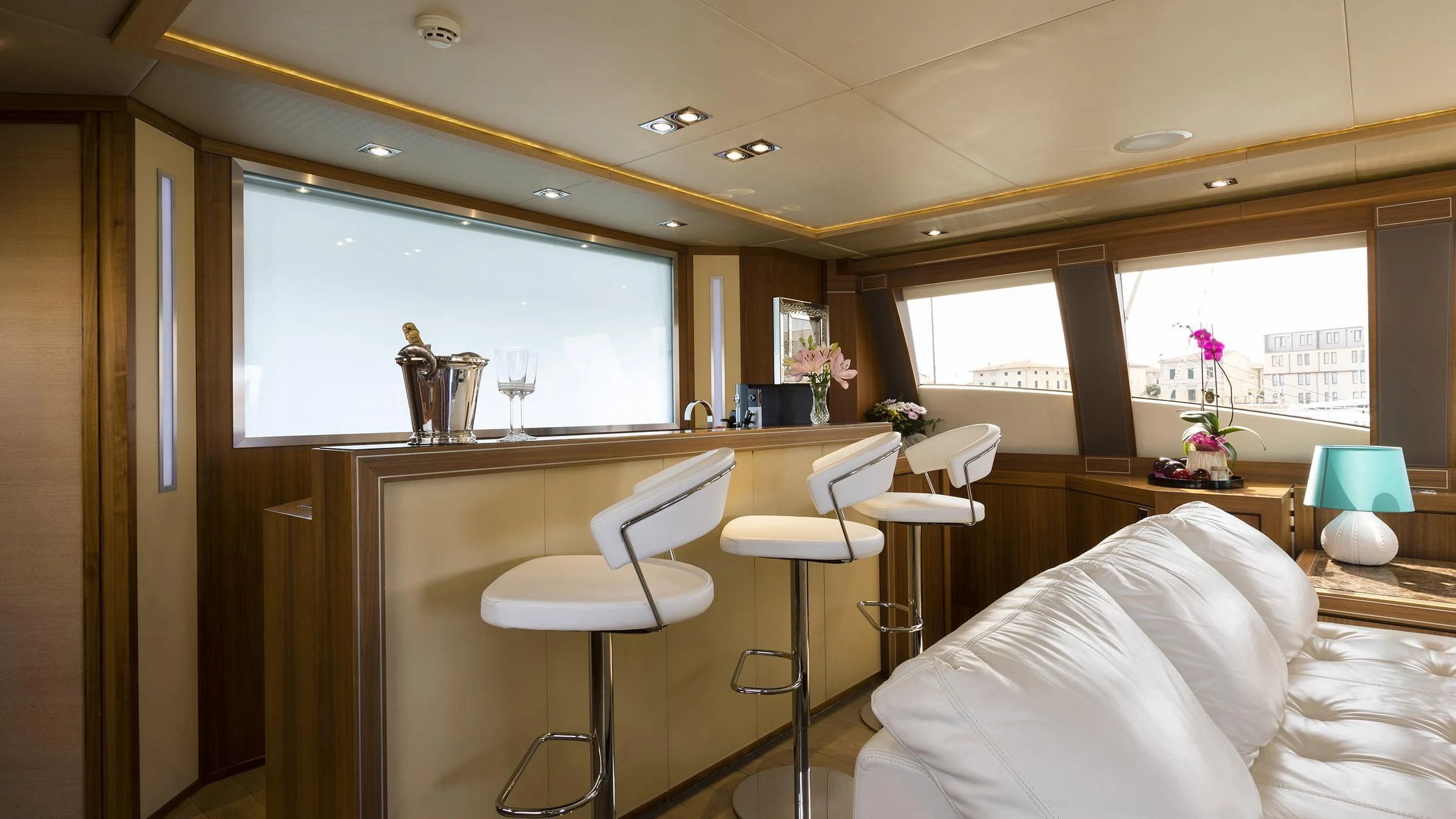 a room with a table and chairs aboard BAGHEERA Yacht for Charter