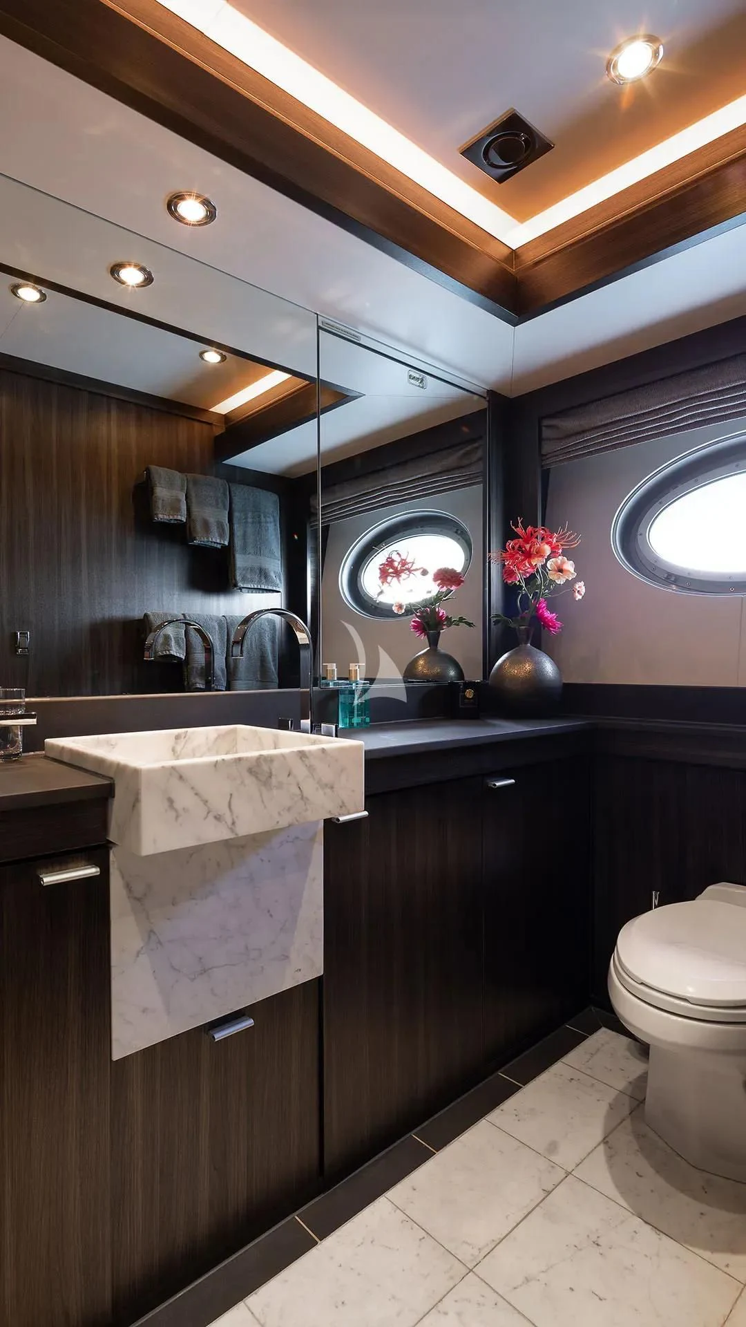 a bathroom with a large mirror aboard BAGHEERA Yacht for Charter