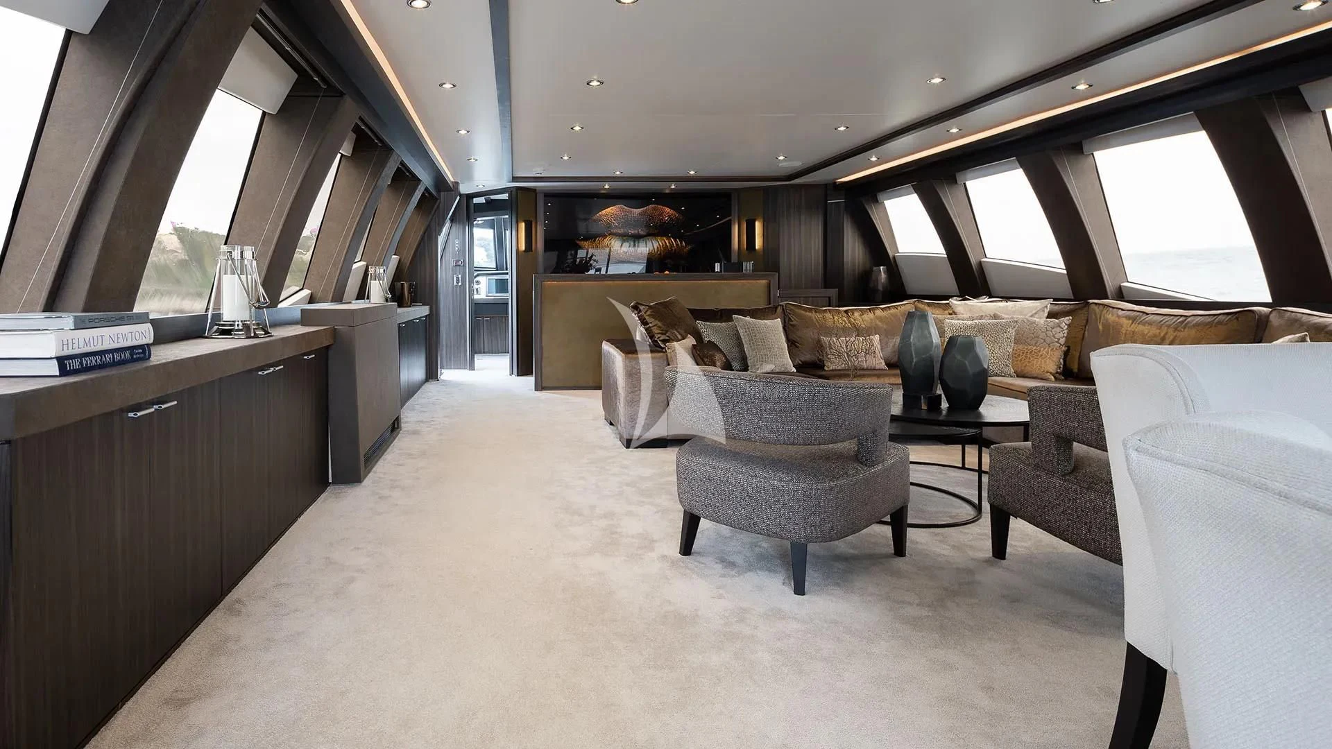a room with couches and a table aboard BAGHEERA Yacht for Charter