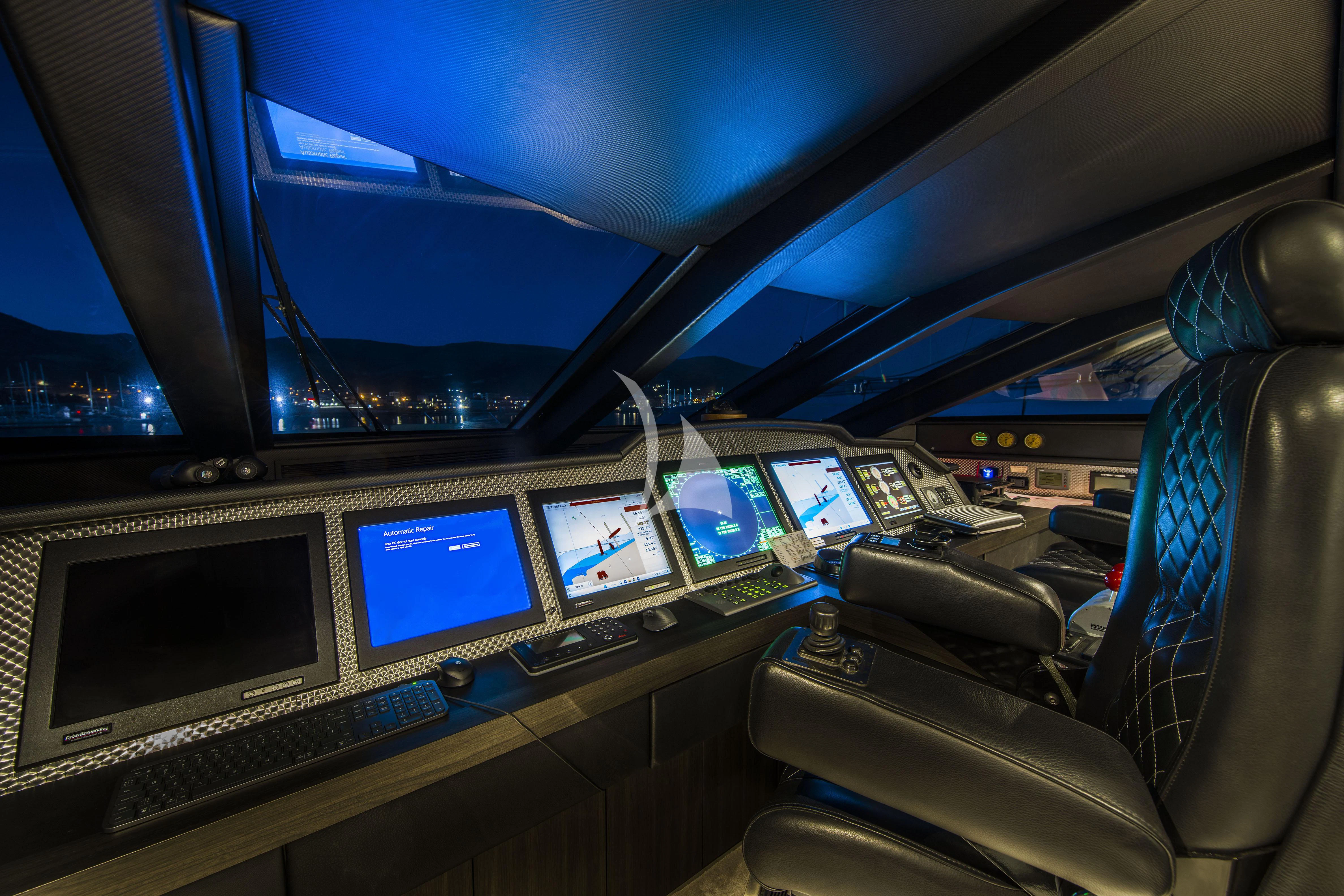 inside of a car with monitors and screens aboard BAGHEERA Yacht for Charter