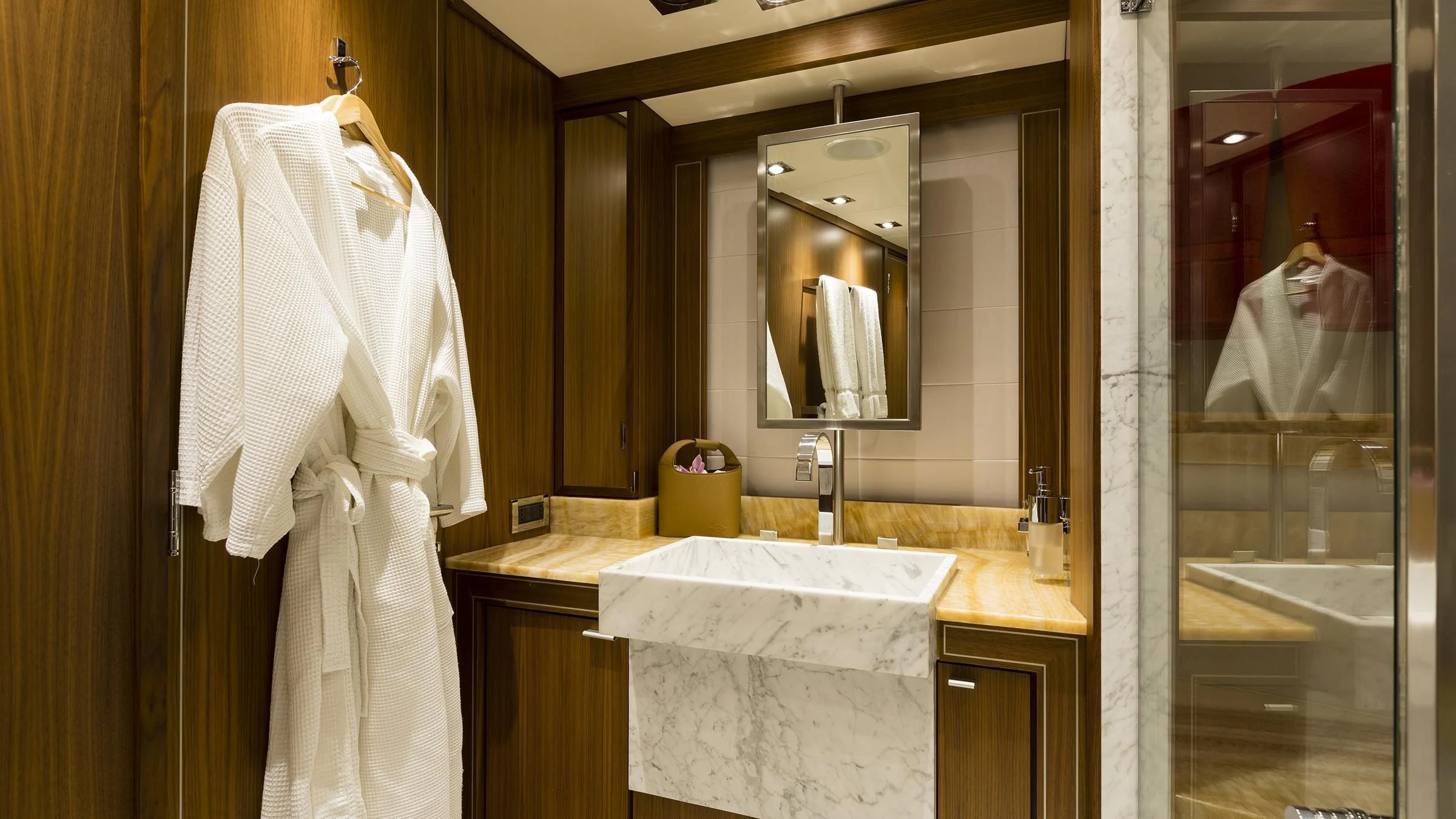 a bathroom with a large mirror aboard BAGHEERA Yacht for Charter
