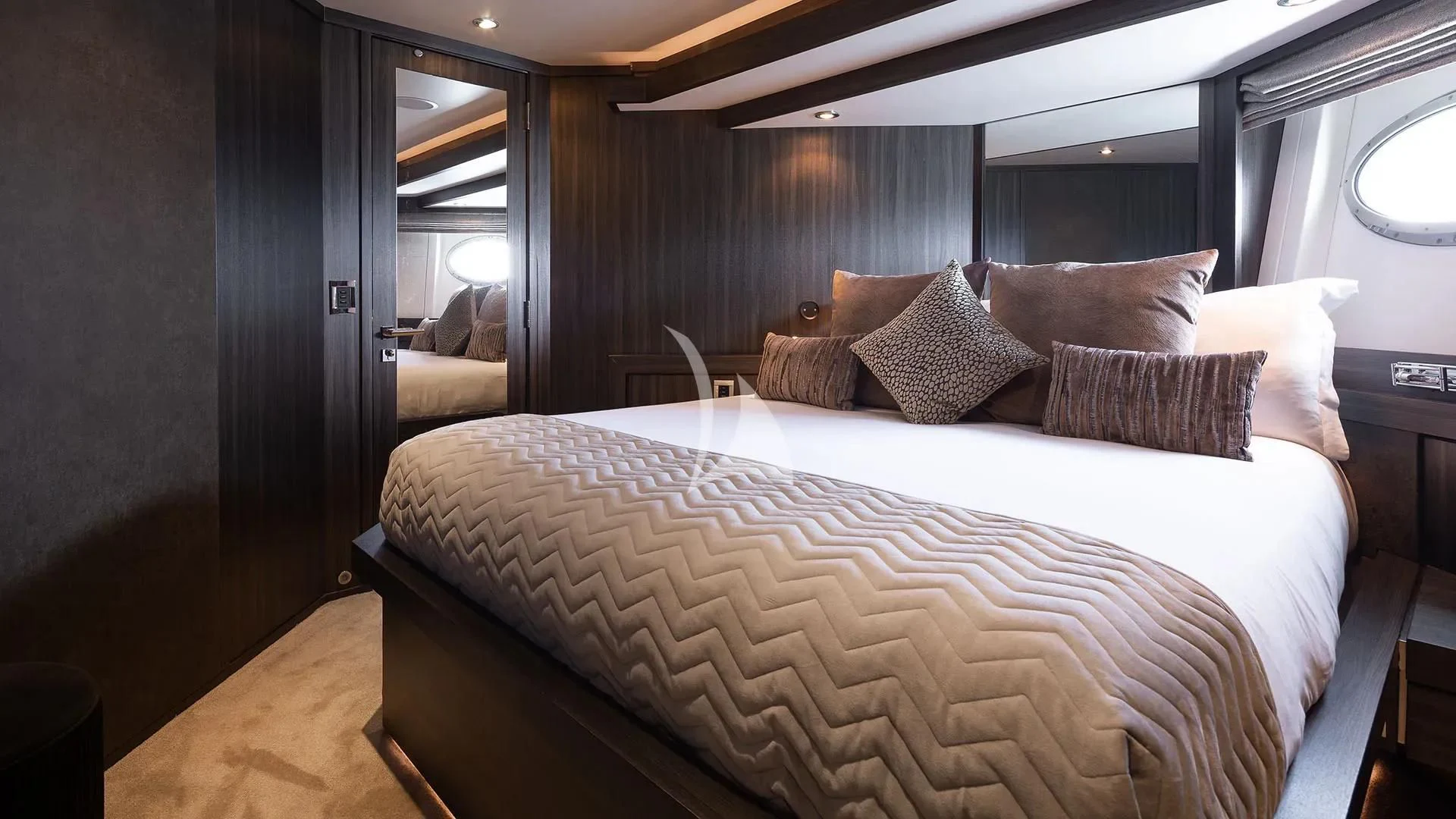 a bed with pillows aboard BAGHEERA Yacht for Charter