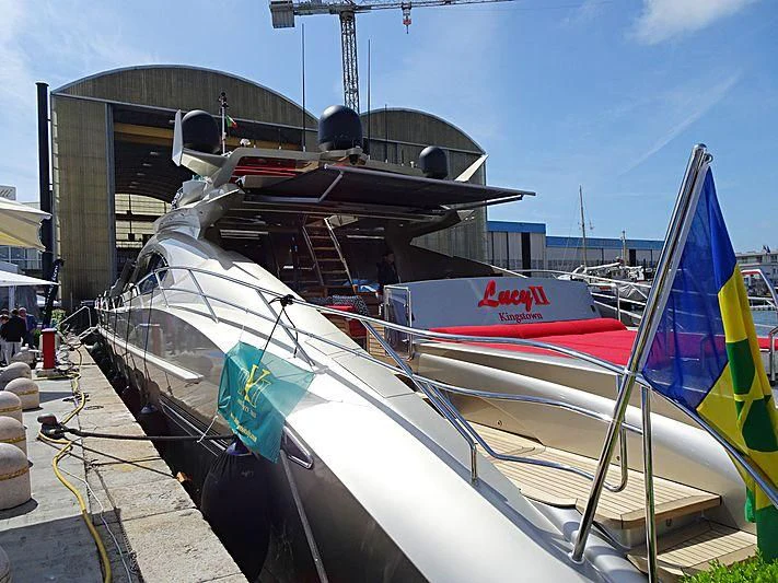 a boat with a flag on the front aboard BAGHEERA Yacht for Charter