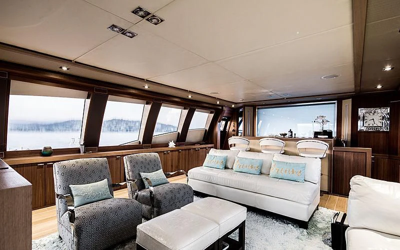 a room with a bed and a couch aboard BAGHEERA Yacht for Charter
