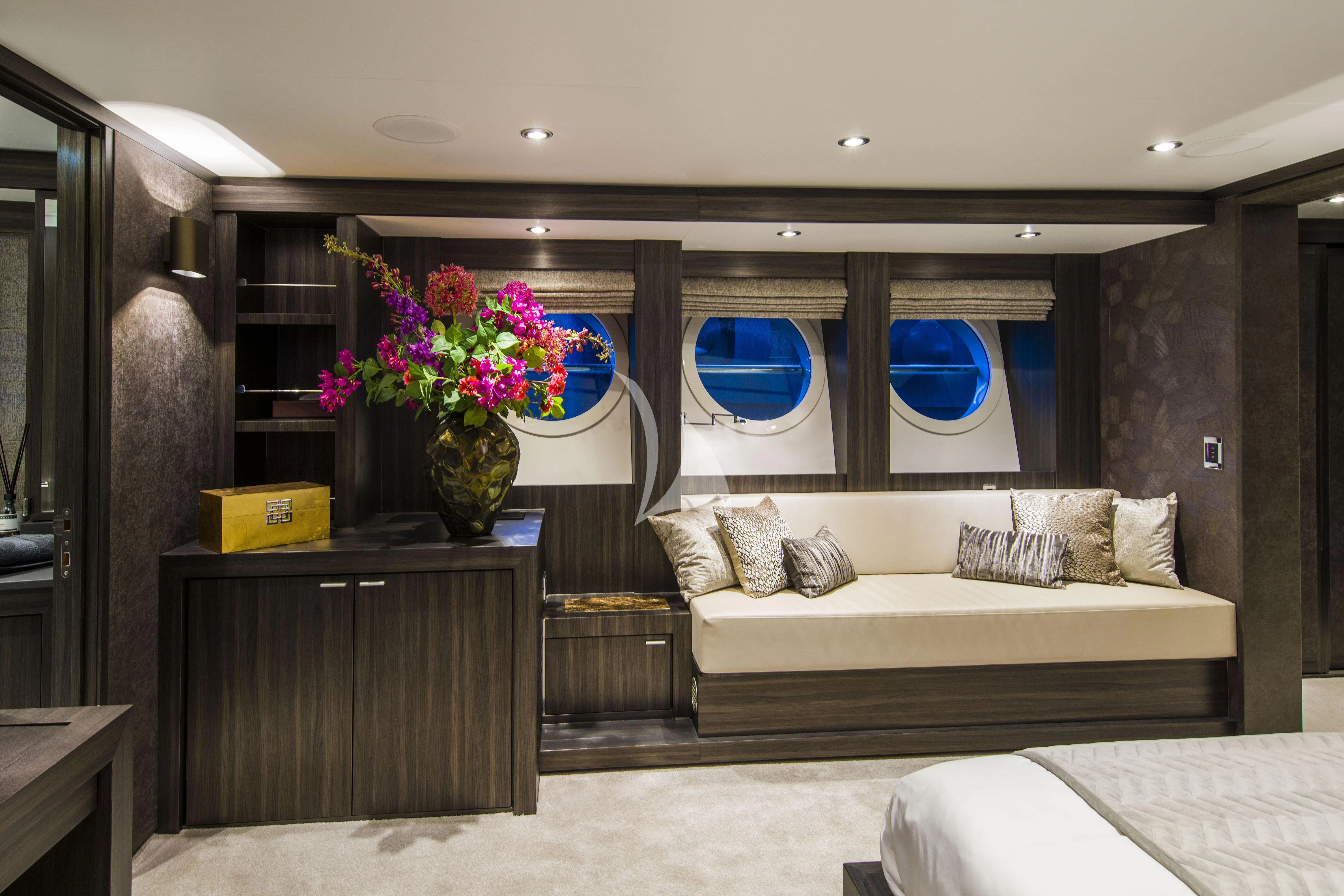 a living room with a large mirror aboard BAGHEERA Yacht for Charter