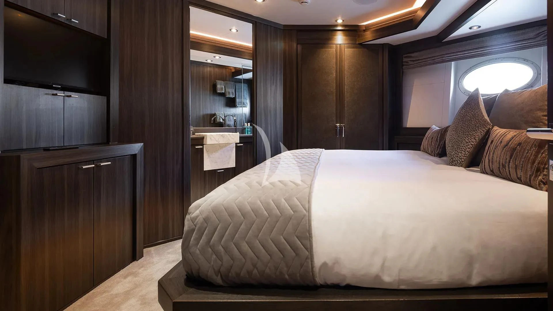 a bed in a room aboard BAGHEERA Yacht for Charter