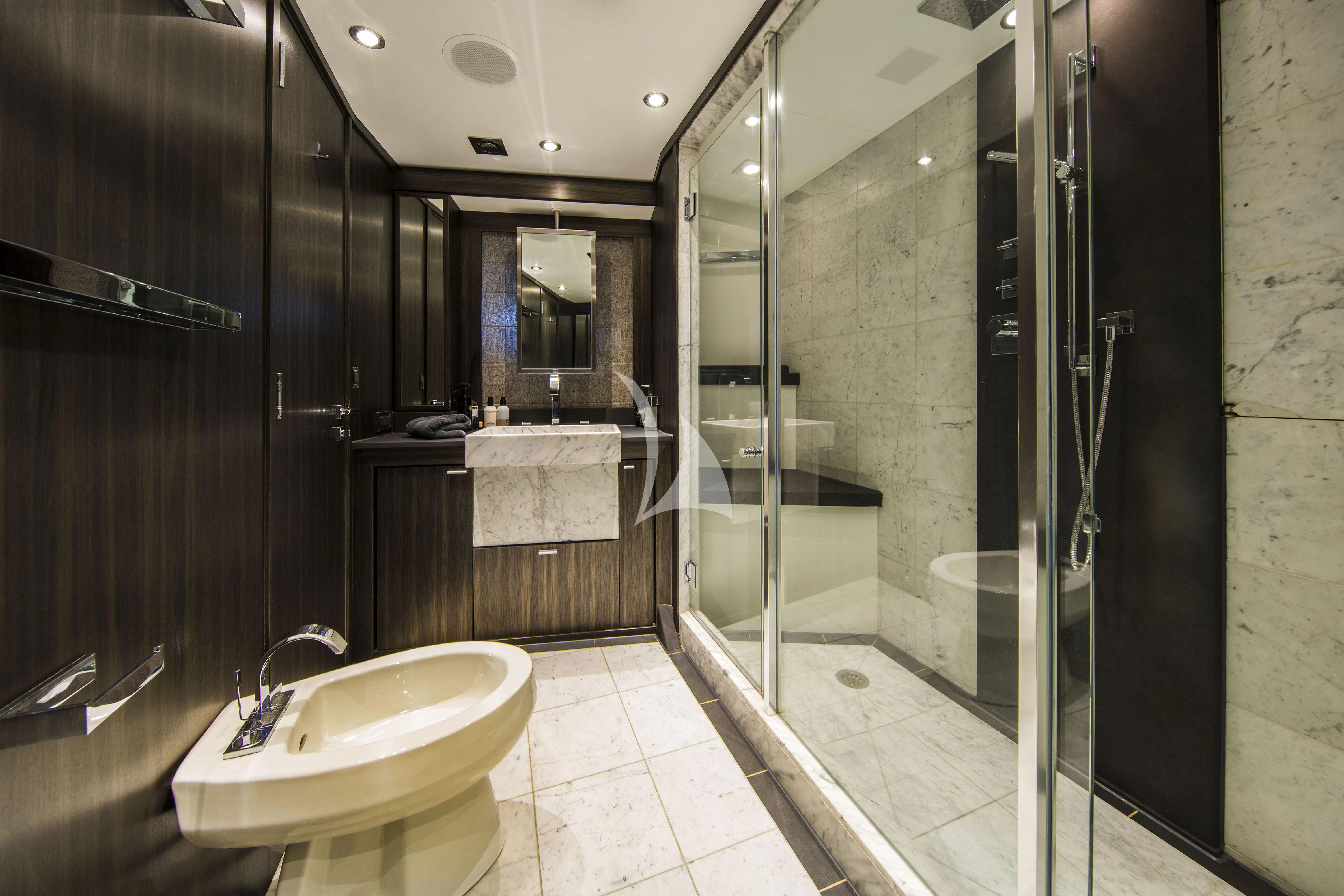 a bathroom with a sink and a shower aboard BAGHEERA Yacht for Charter
