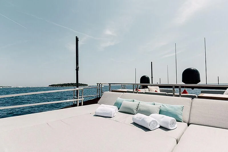 a white couch on a boat aboard BAGHEERA Yacht for Charter