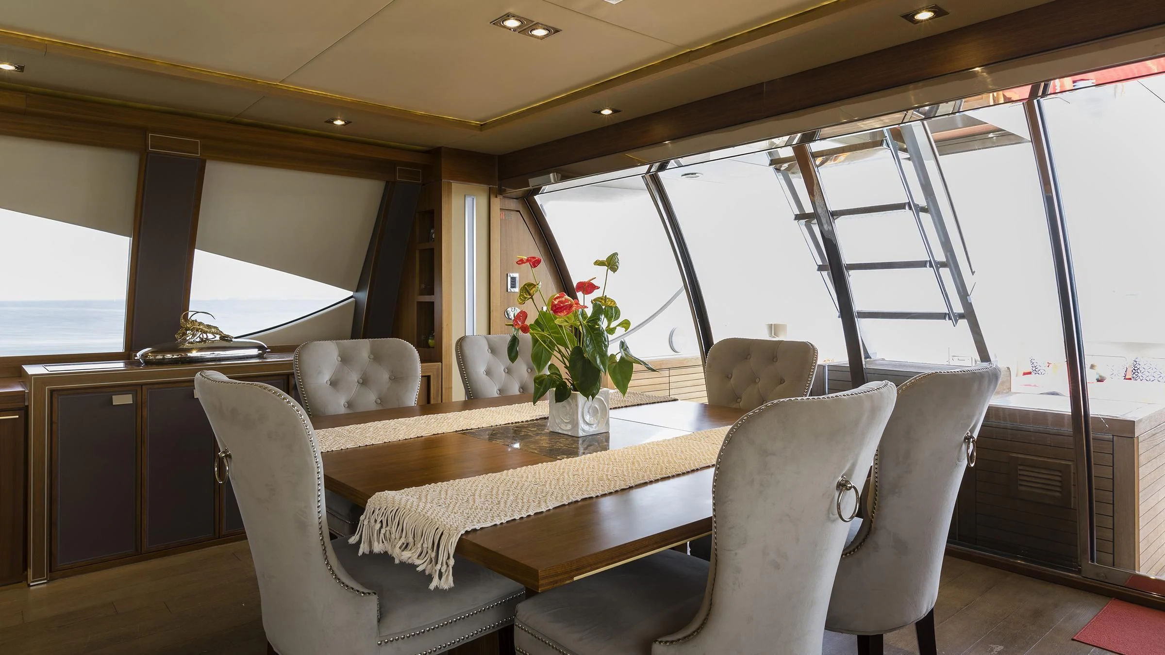 a dining table in a bus aboard BAGHEERA Yacht for Charter