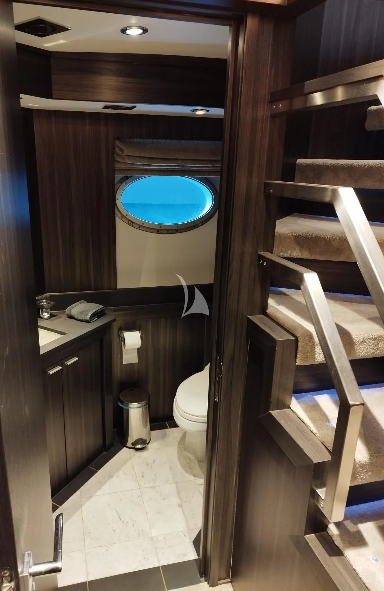 a bathroom with a round blue object aboard BAGHEERA Yacht for Charter