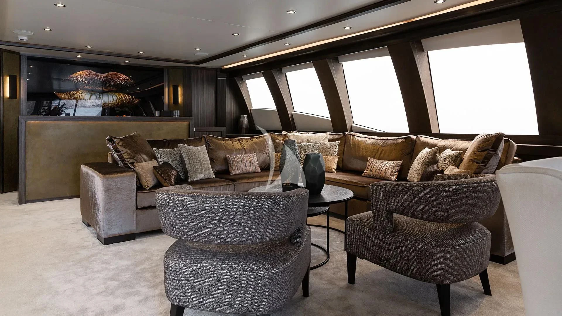 a living room with a couch and a tv aboard BAGHEERA Yacht for Charter