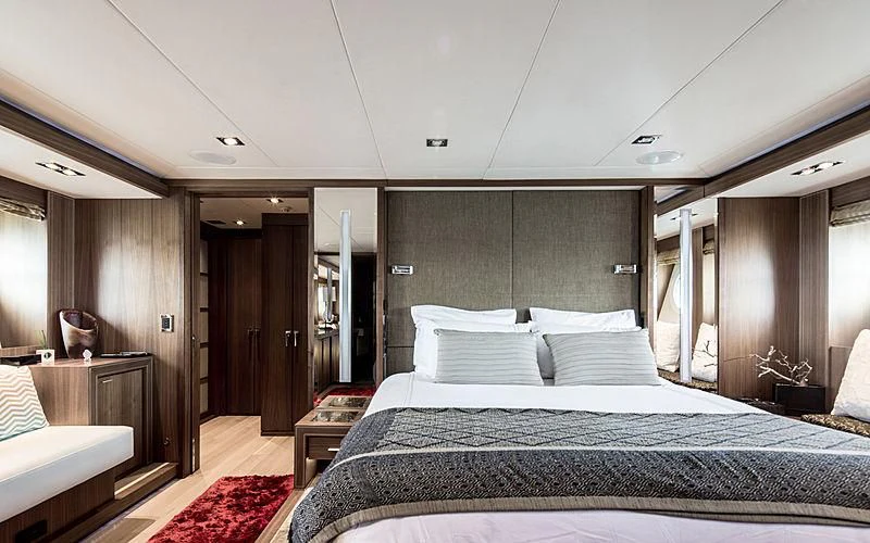 a large bedroom with a large bed aboard BAGHEERA Yacht for Charter