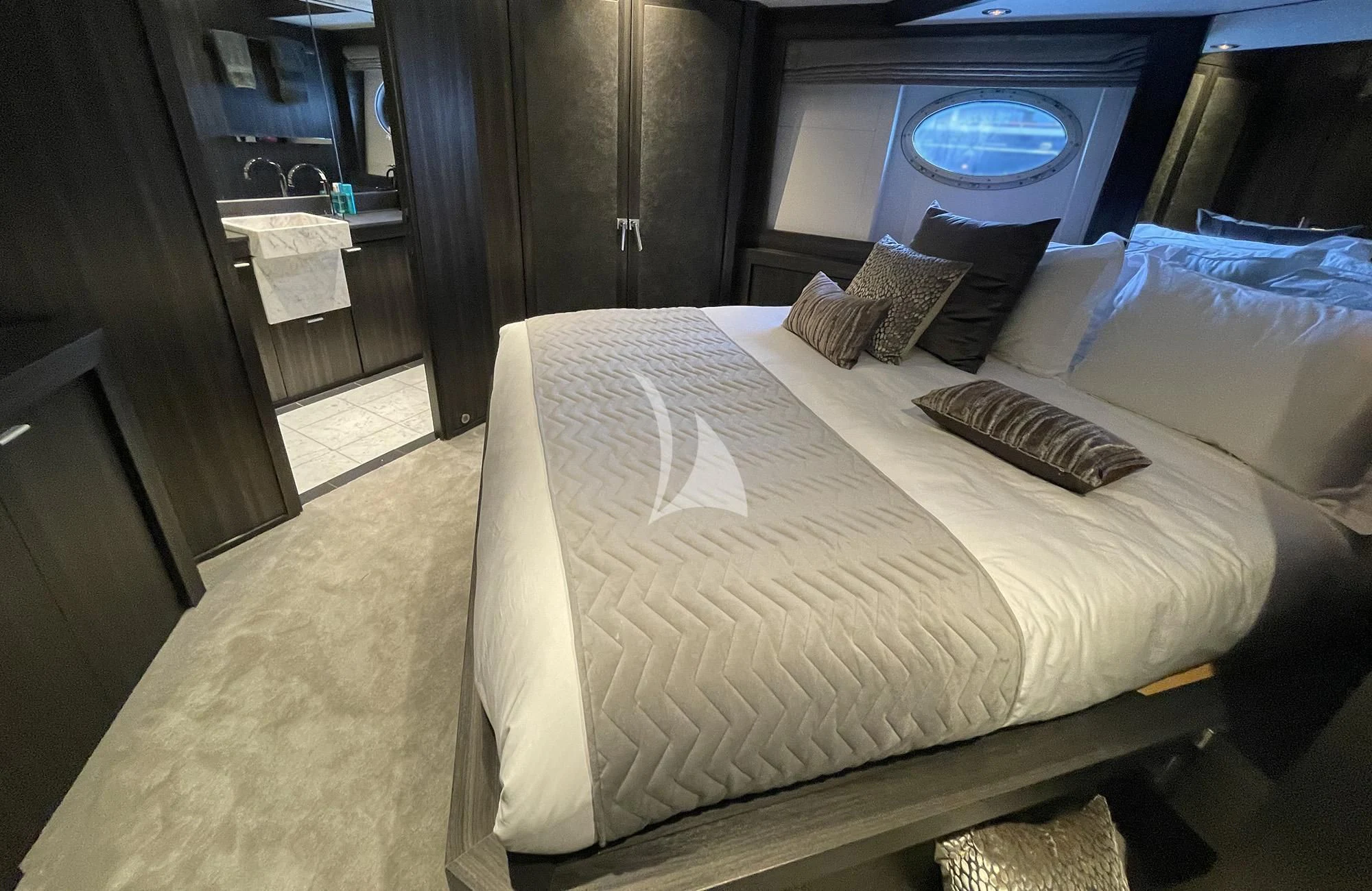 a bed in a room aboard BAGHEERA Yacht for Charter