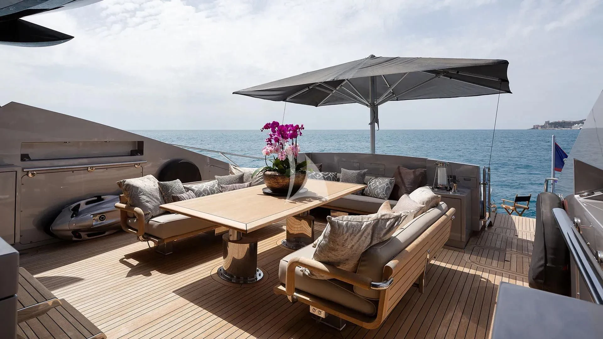 a living room with a large umbrella aboard BAGHEERA Yacht for Charter