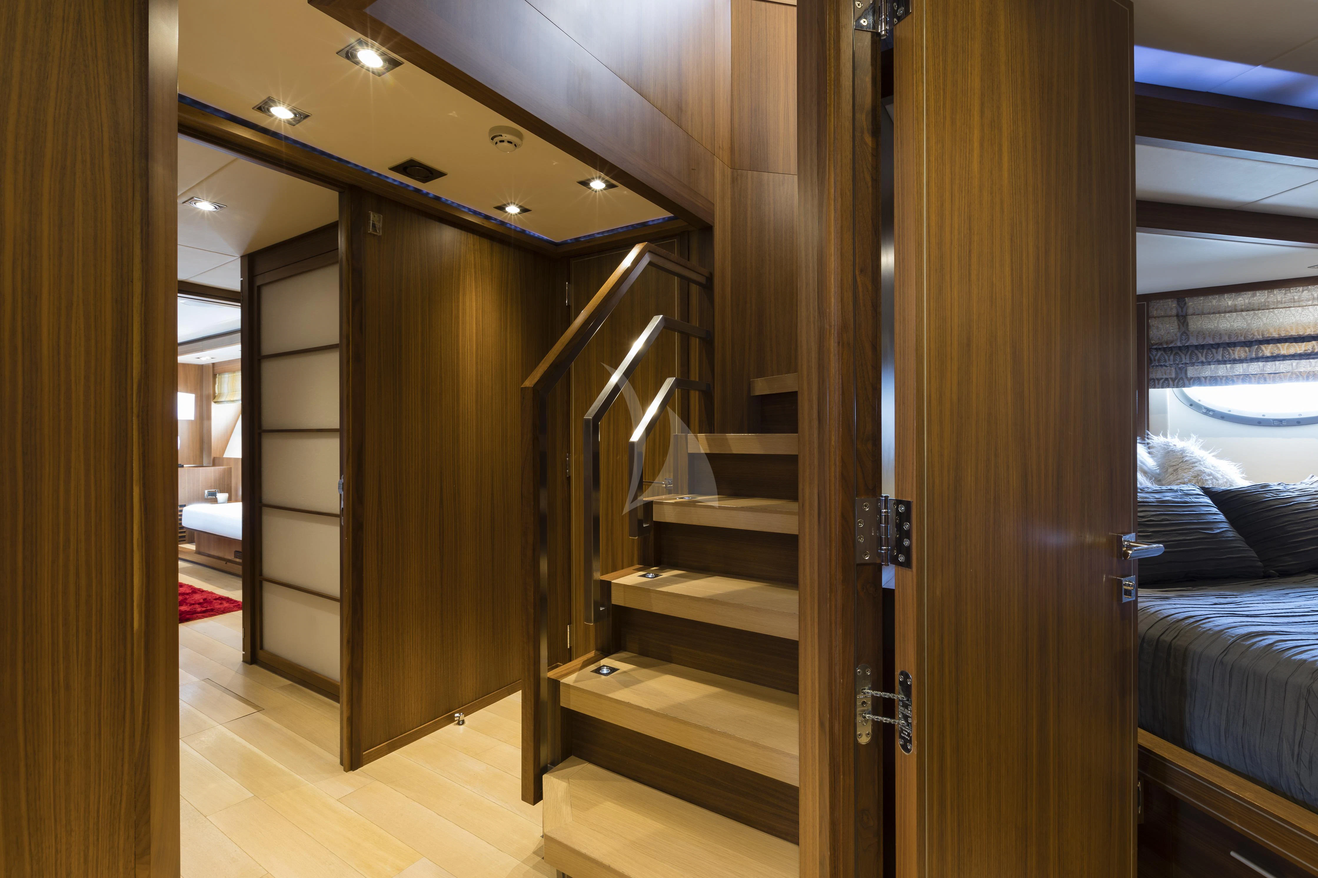 a wooden bunk bed in a room aboard BAGHEERA Yacht for Charter