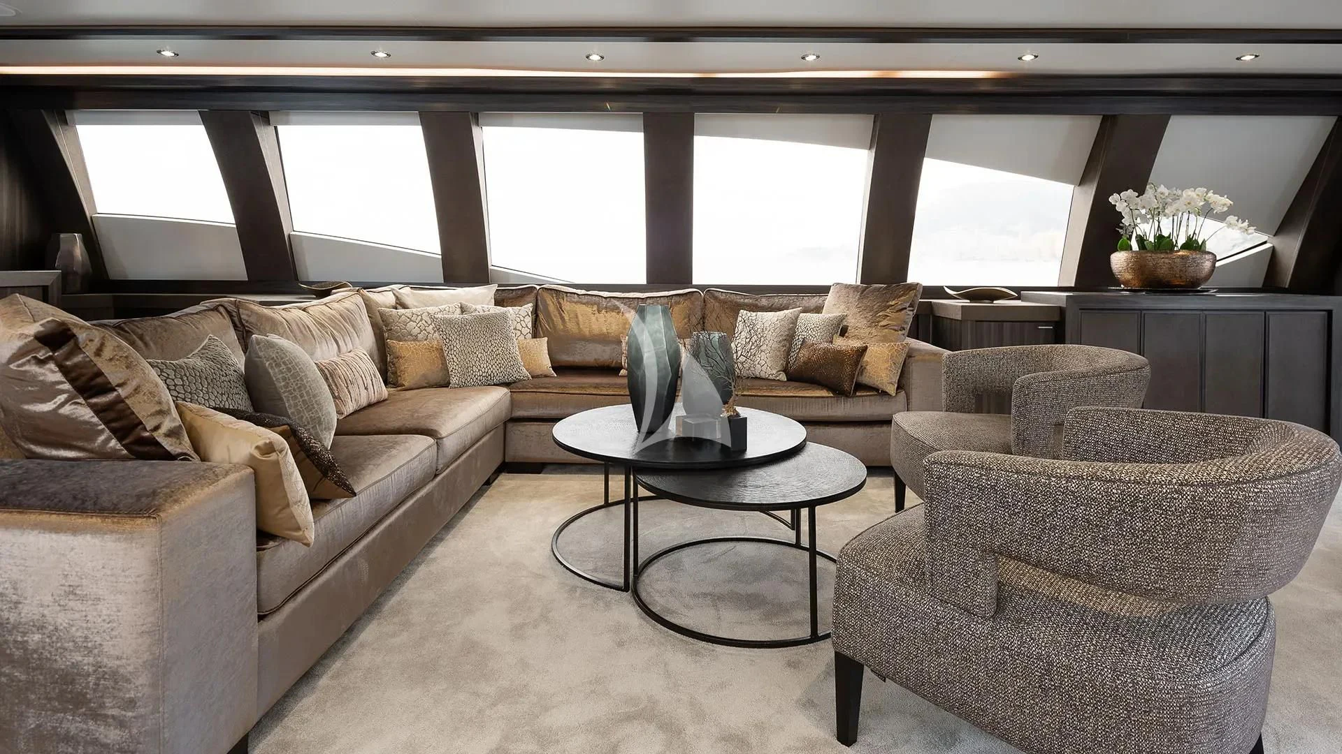 a living room with a couch and a coffee table aboard BAGHEERA Yacht for Charter