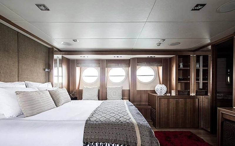 a large bedroom with a large bed aboard BAGHEERA Yacht for Charter