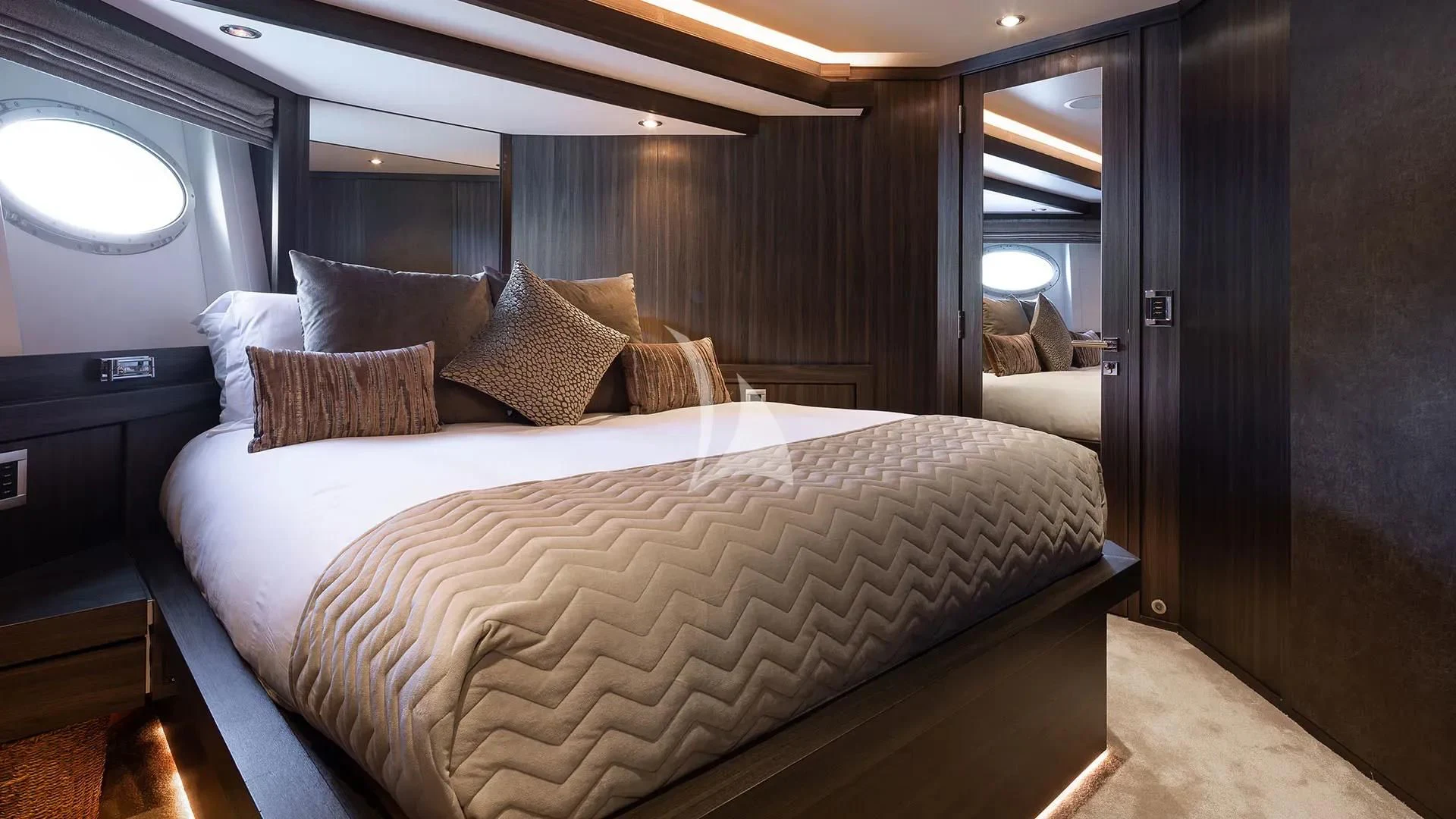 a bed with pillows aboard BAGHEERA Yacht for Charter