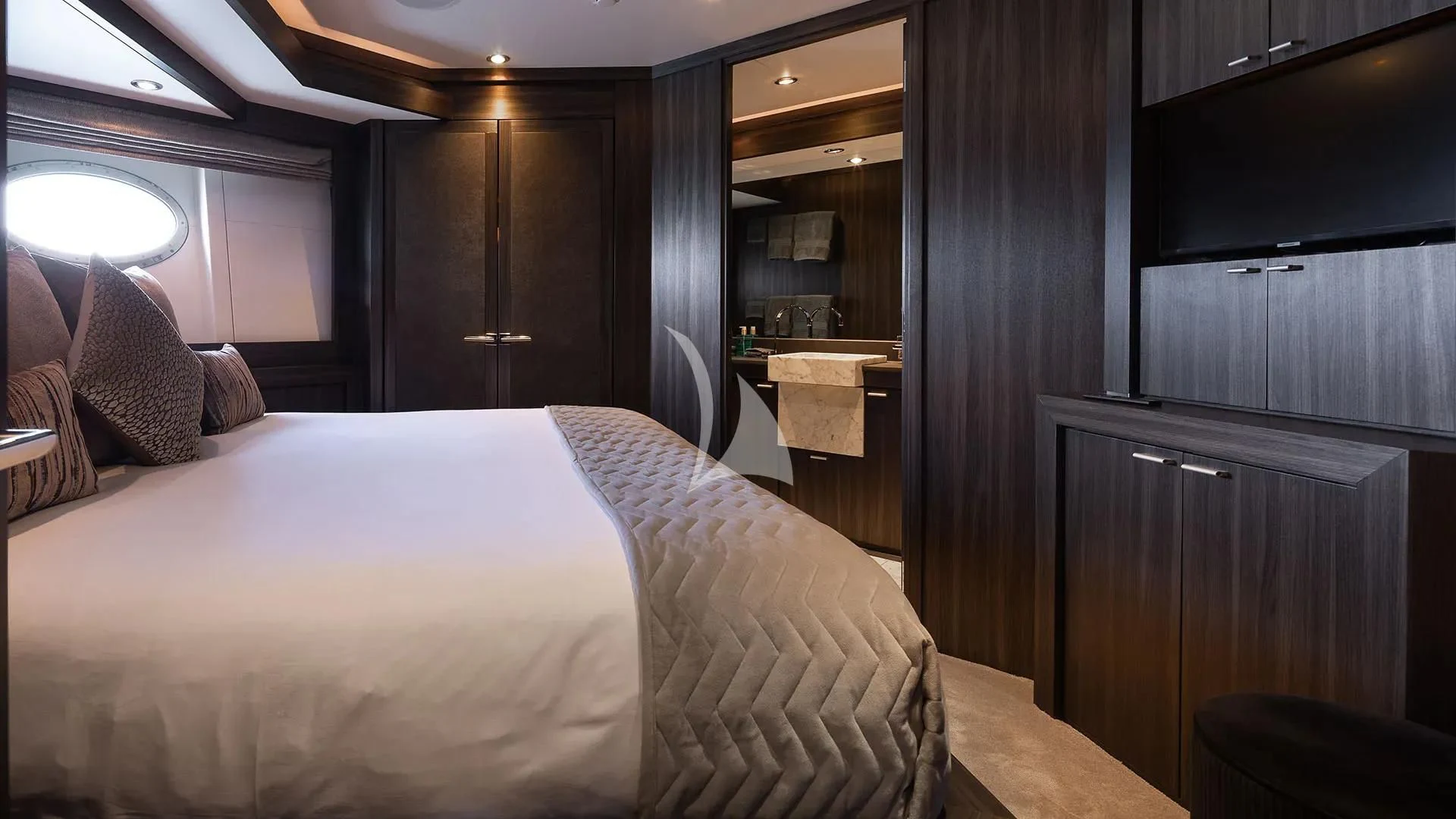 a bed in a room aboard BAGHEERA Yacht for Charter