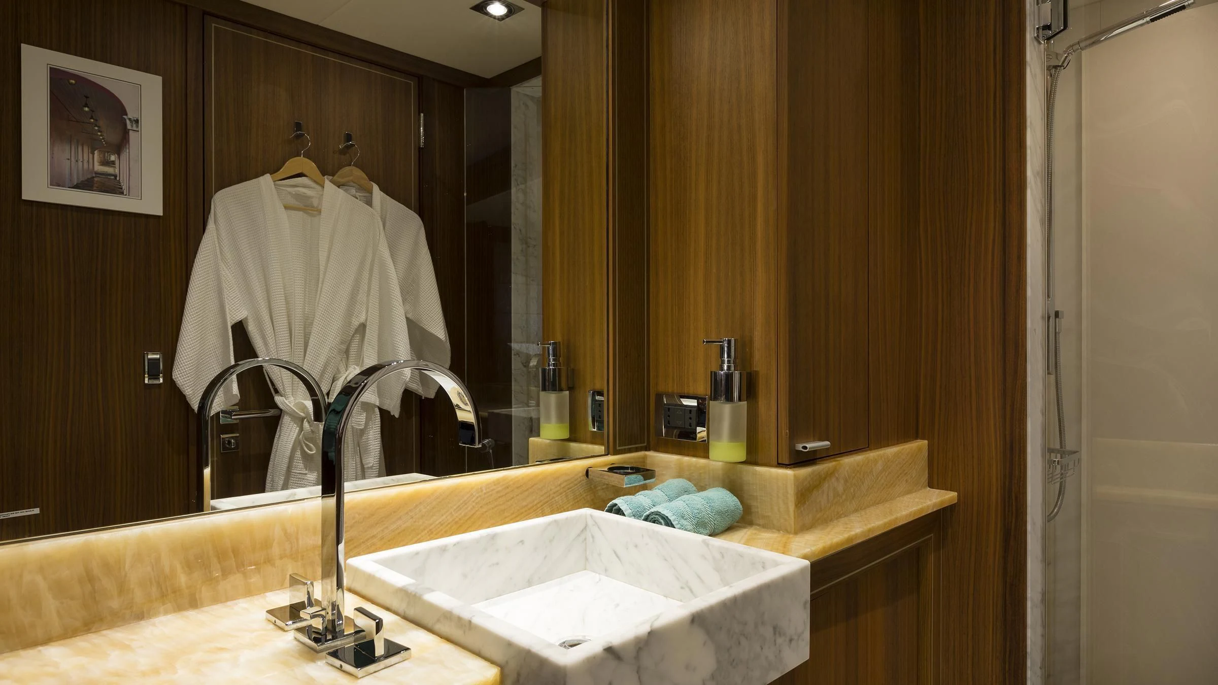 a bathroom with a large mirror aboard BAGHEERA Yacht for Charter