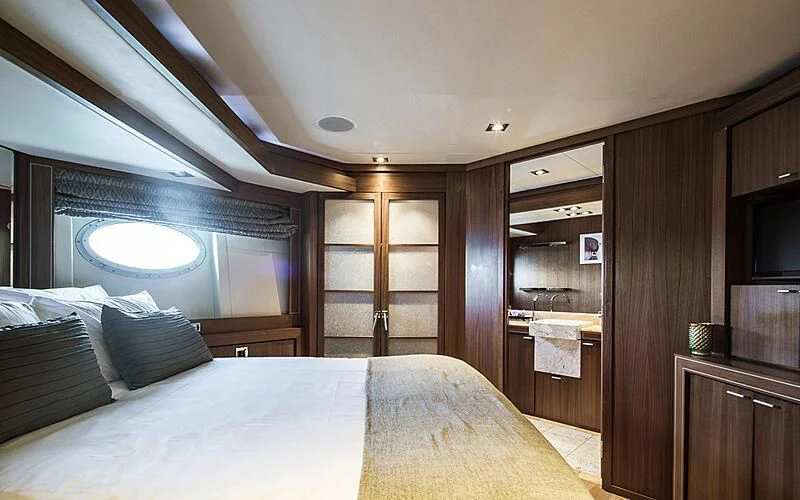 a bed in a room aboard BAGHEERA Yacht for Charter