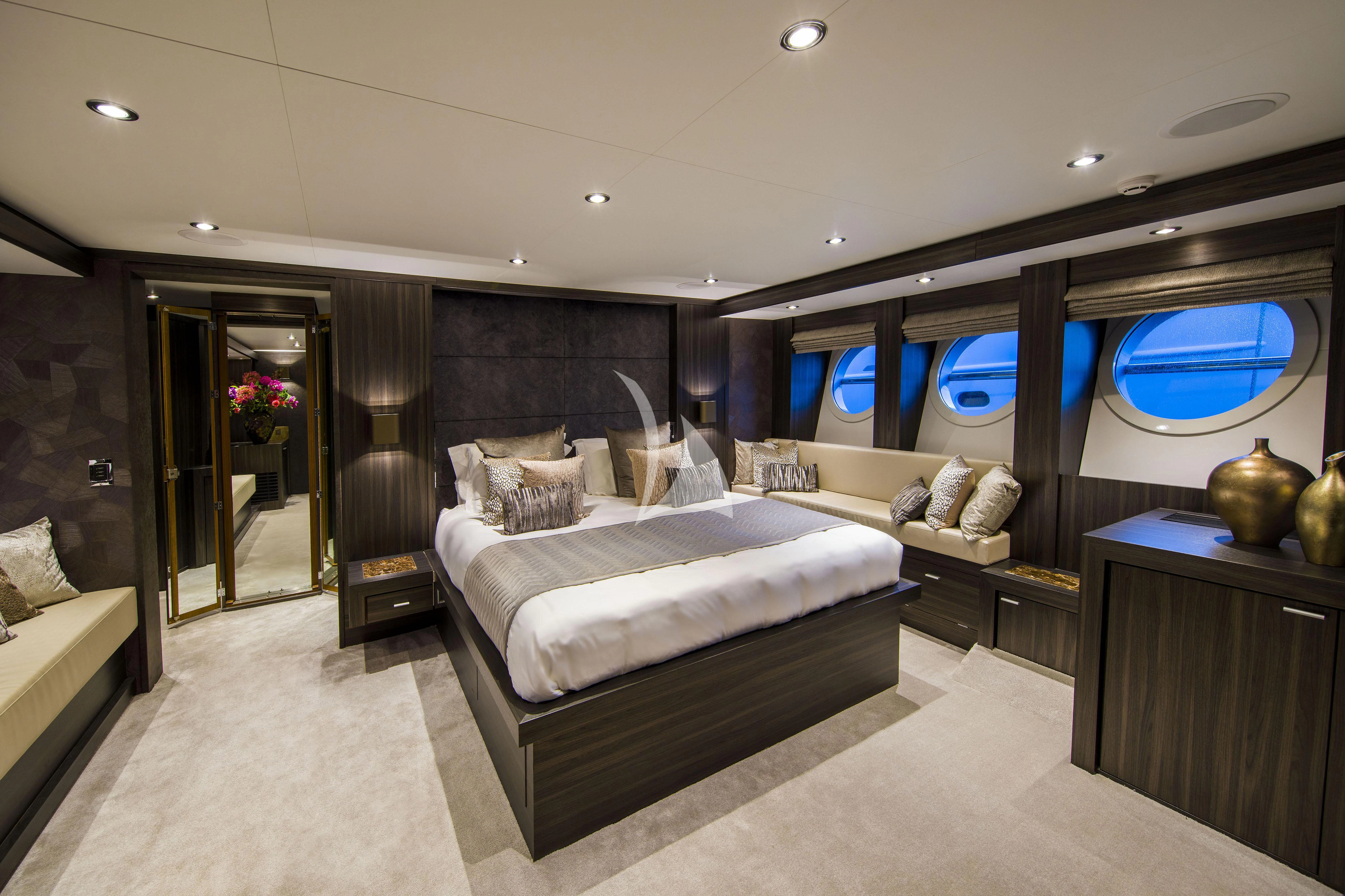 a room with a bed and a mirror aboard BAGHEERA Yacht for Charter