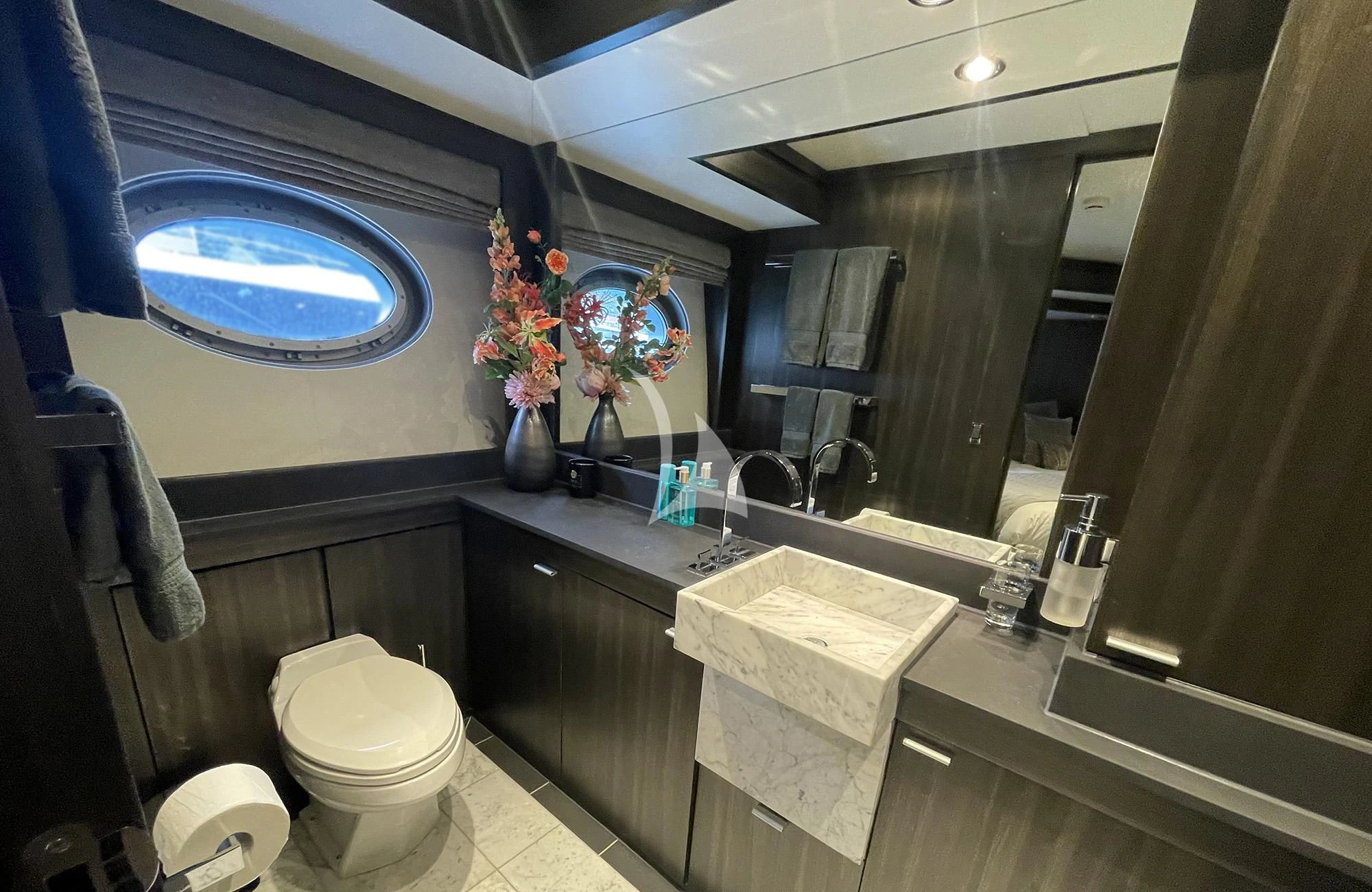 a bathroom with a large mirror aboard BAGHEERA Yacht for Charter