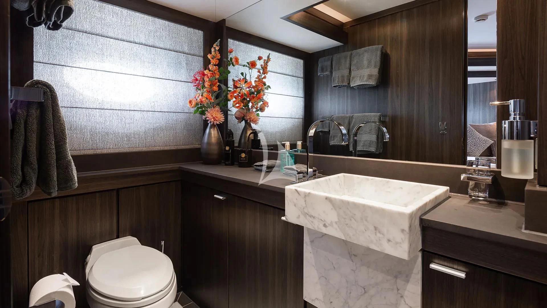 a bathroom with a sink toilet and bathtub aboard BAGHEERA Yacht for Charter