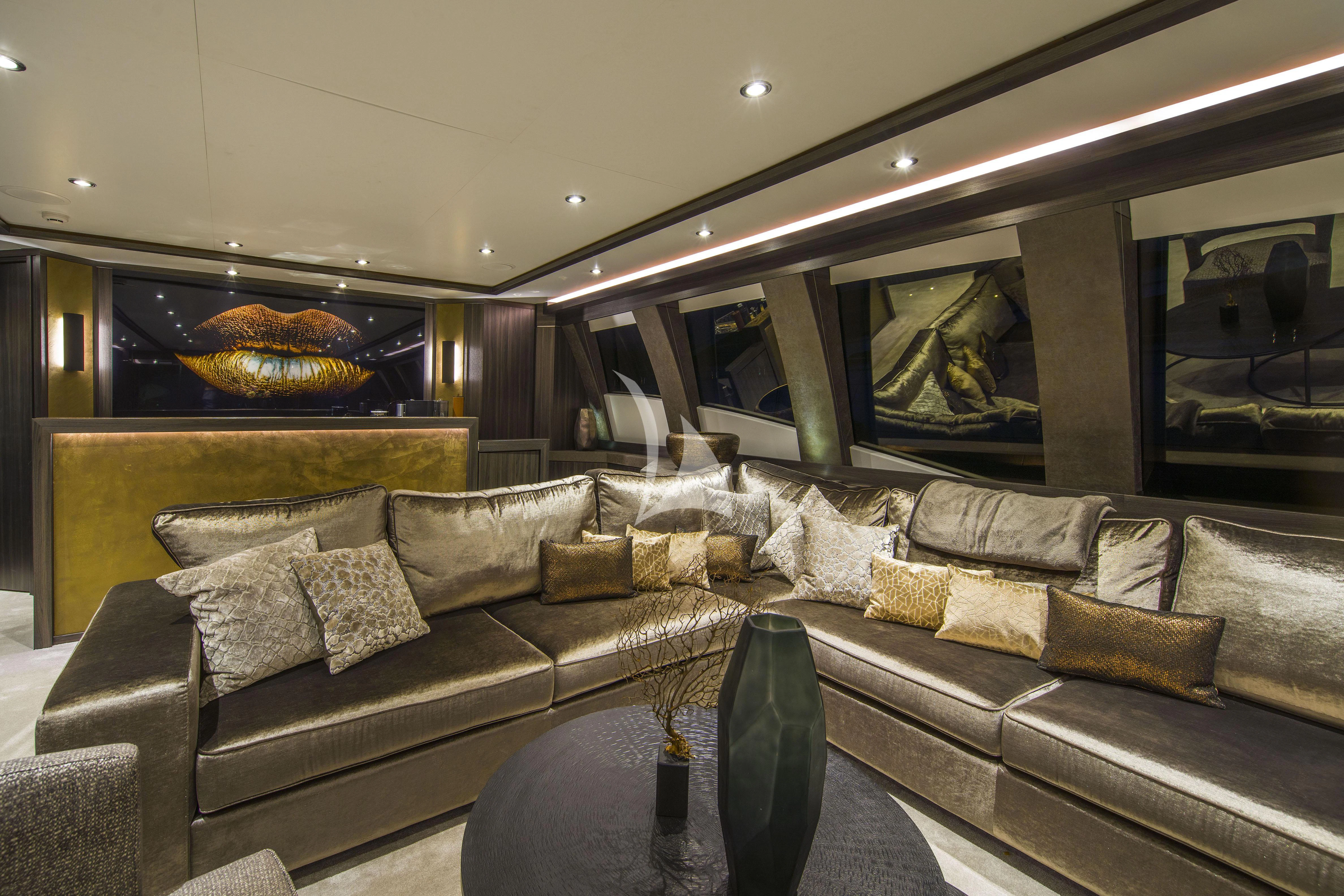 a leather couch in a room aboard BAGHEERA Yacht for Charter