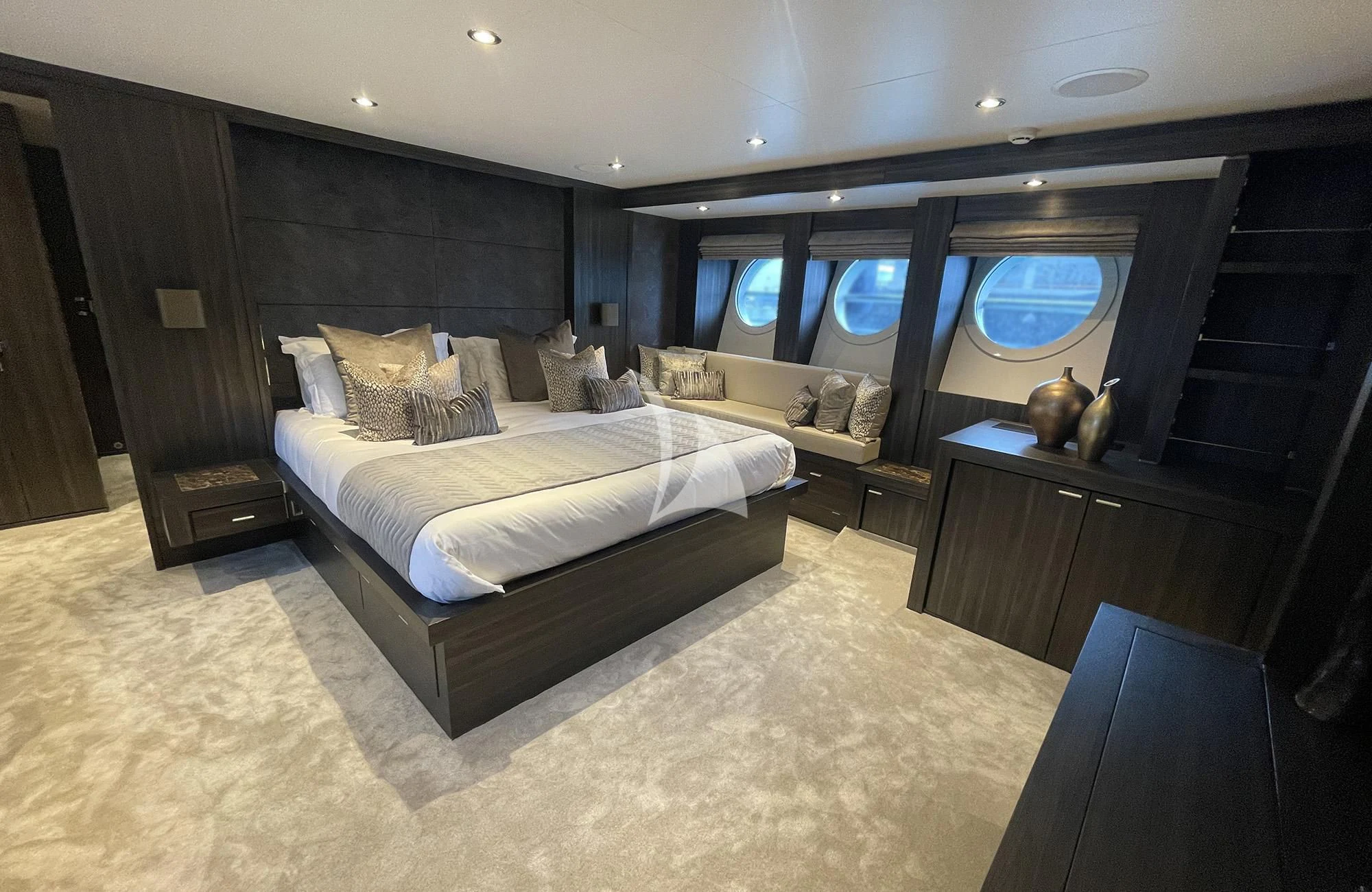a hotel room with a bed aboard BAGHEERA Yacht for Charter