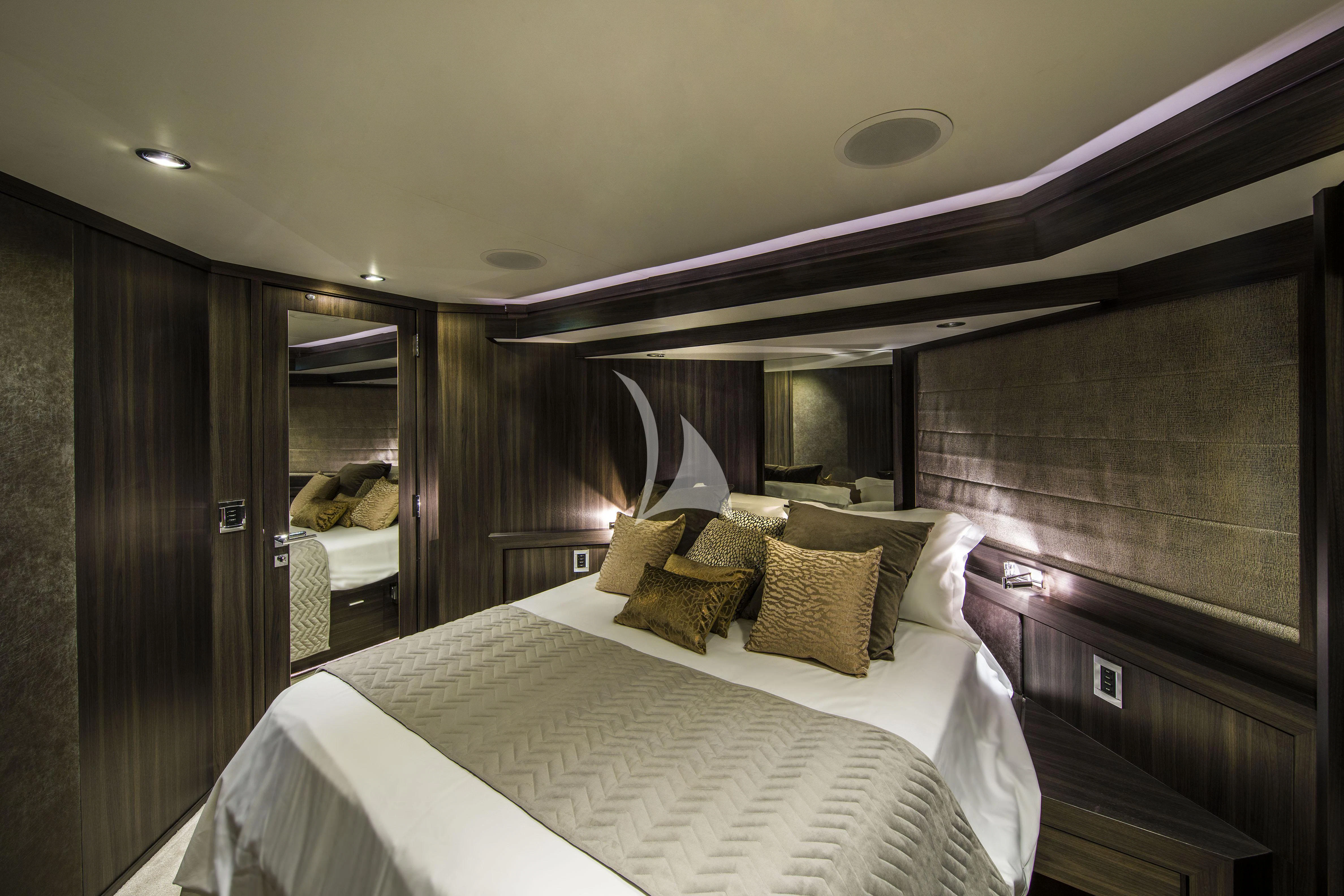 a hotel room with a bed aboard BAGHEERA Yacht for Charter