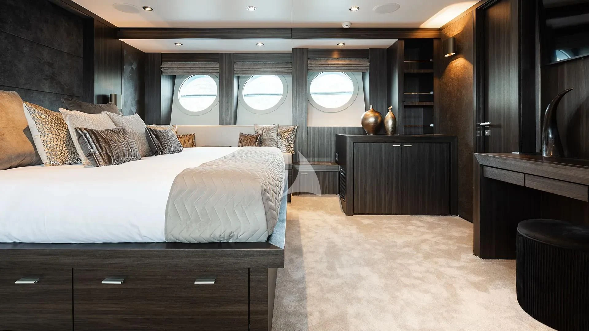 a room with a bed and a mirror aboard BAGHEERA Yacht for Charter