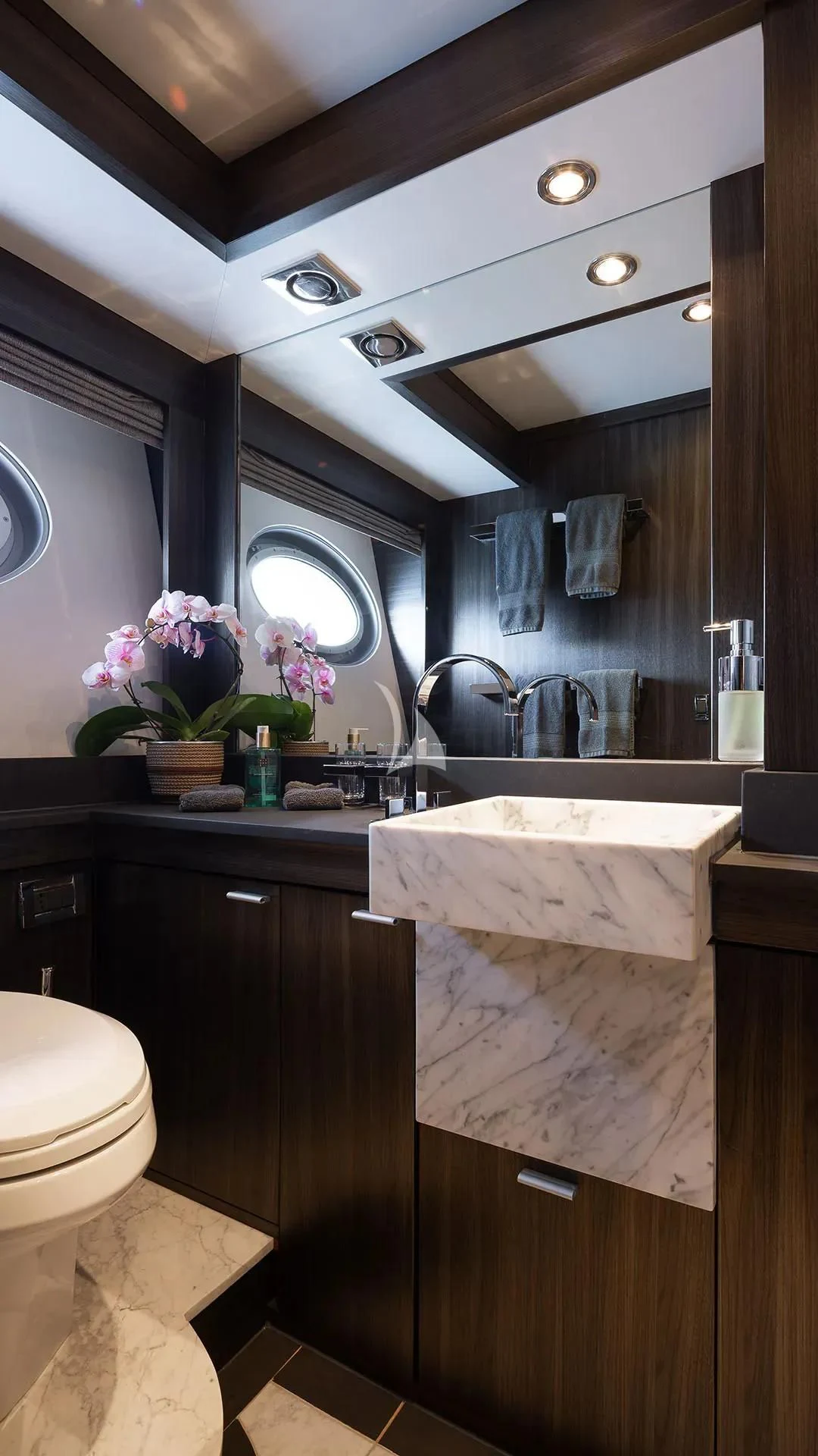 a bathroom with a large mirror aboard BAGHEERA Yacht for Charter