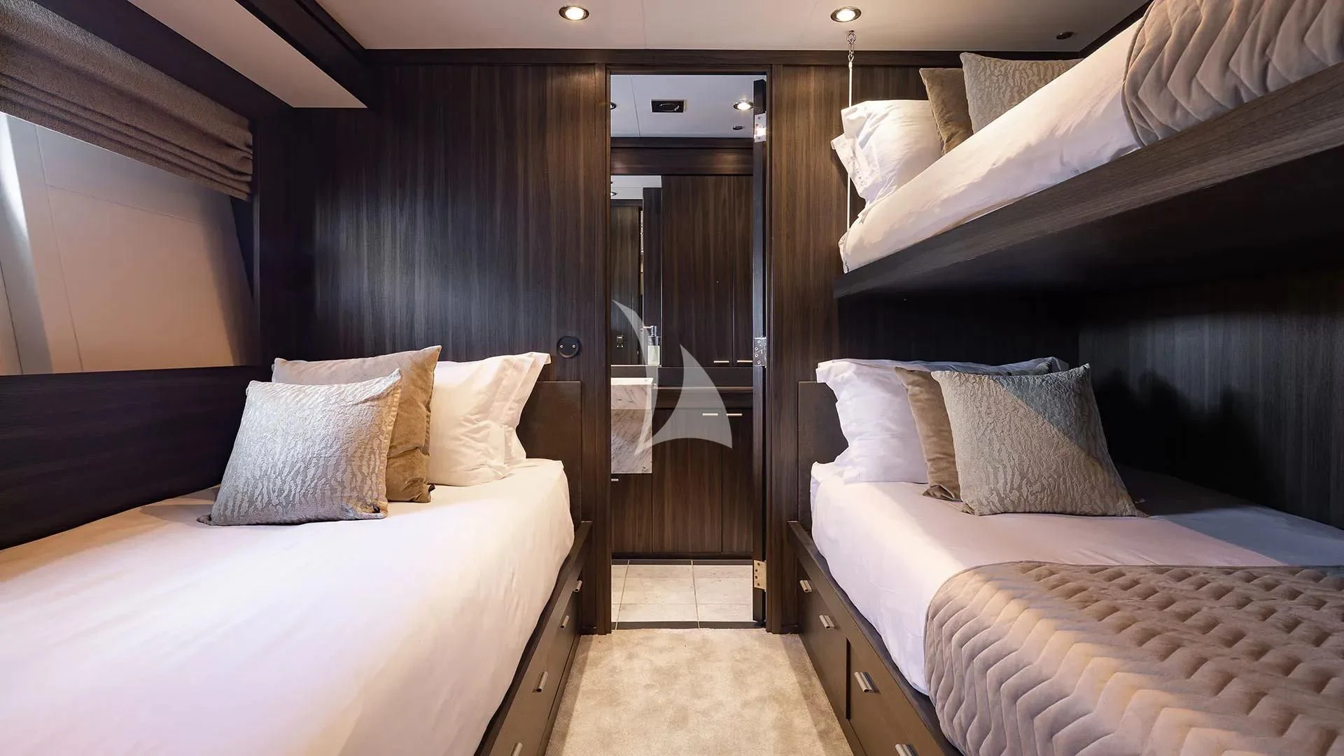 a room with a bed and a door aboard BAGHEERA Yacht for Charter