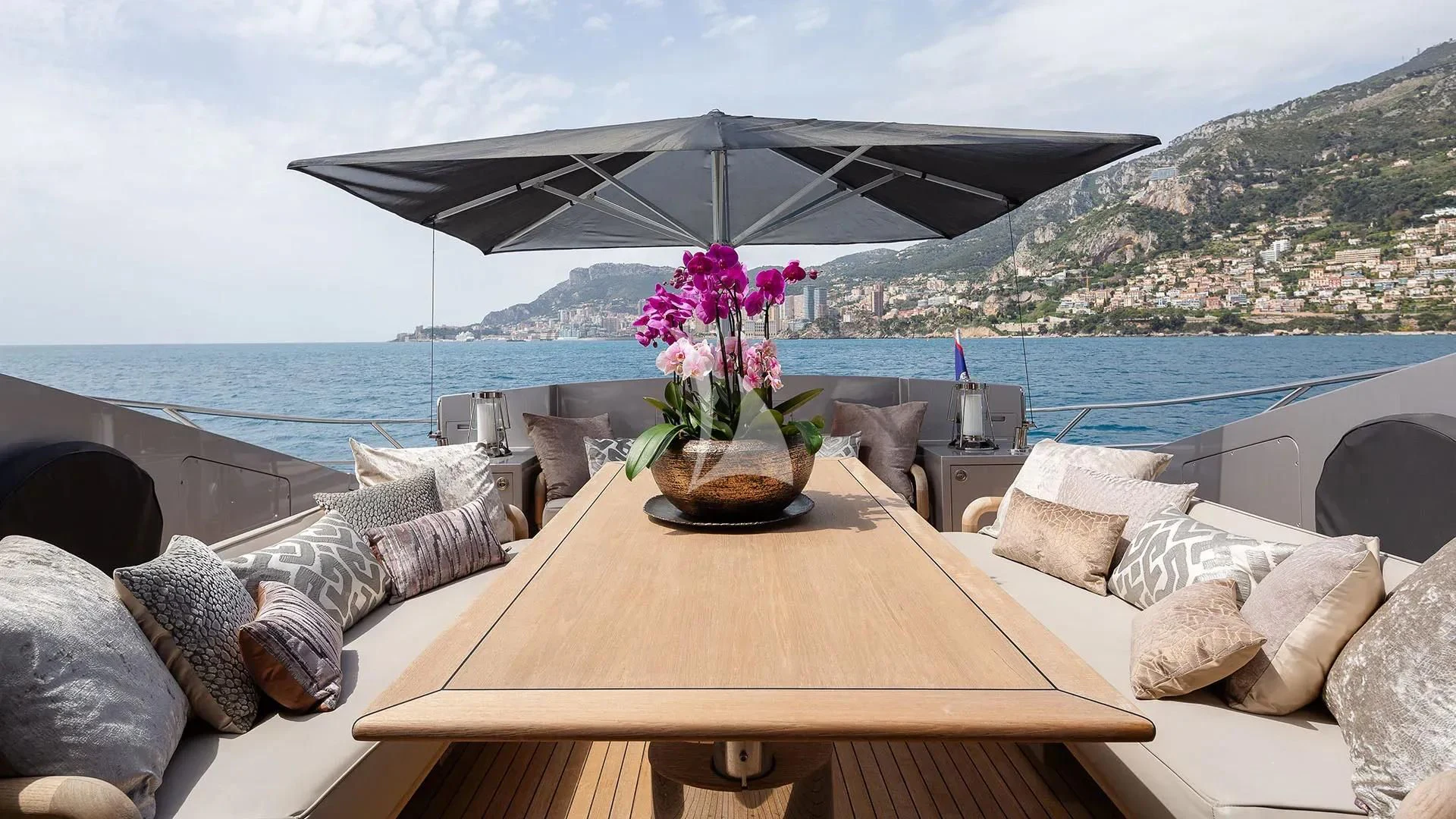 a table with a flower on it aboard BAGHEERA Yacht for Charter